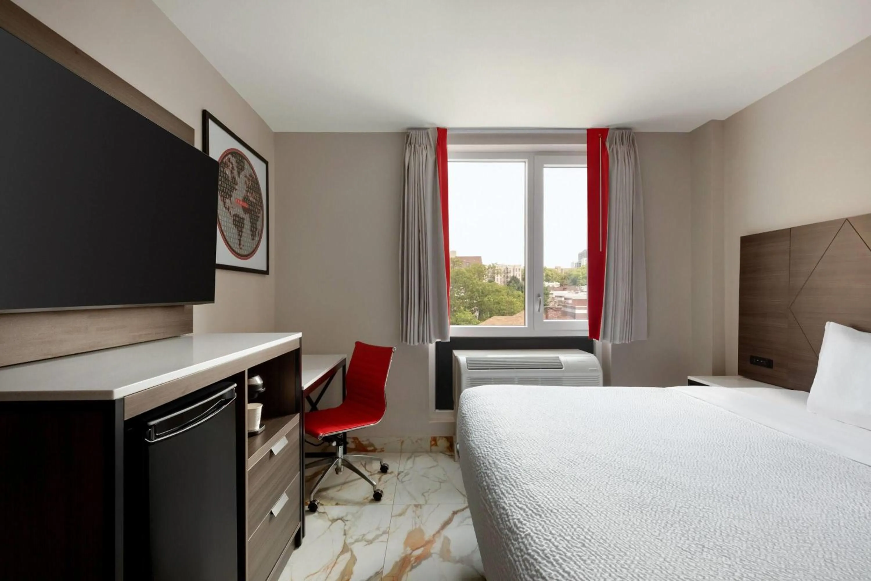 Photo of the whole room, Bed in Ramada by Wyndham Brooklyn Empire Blvd