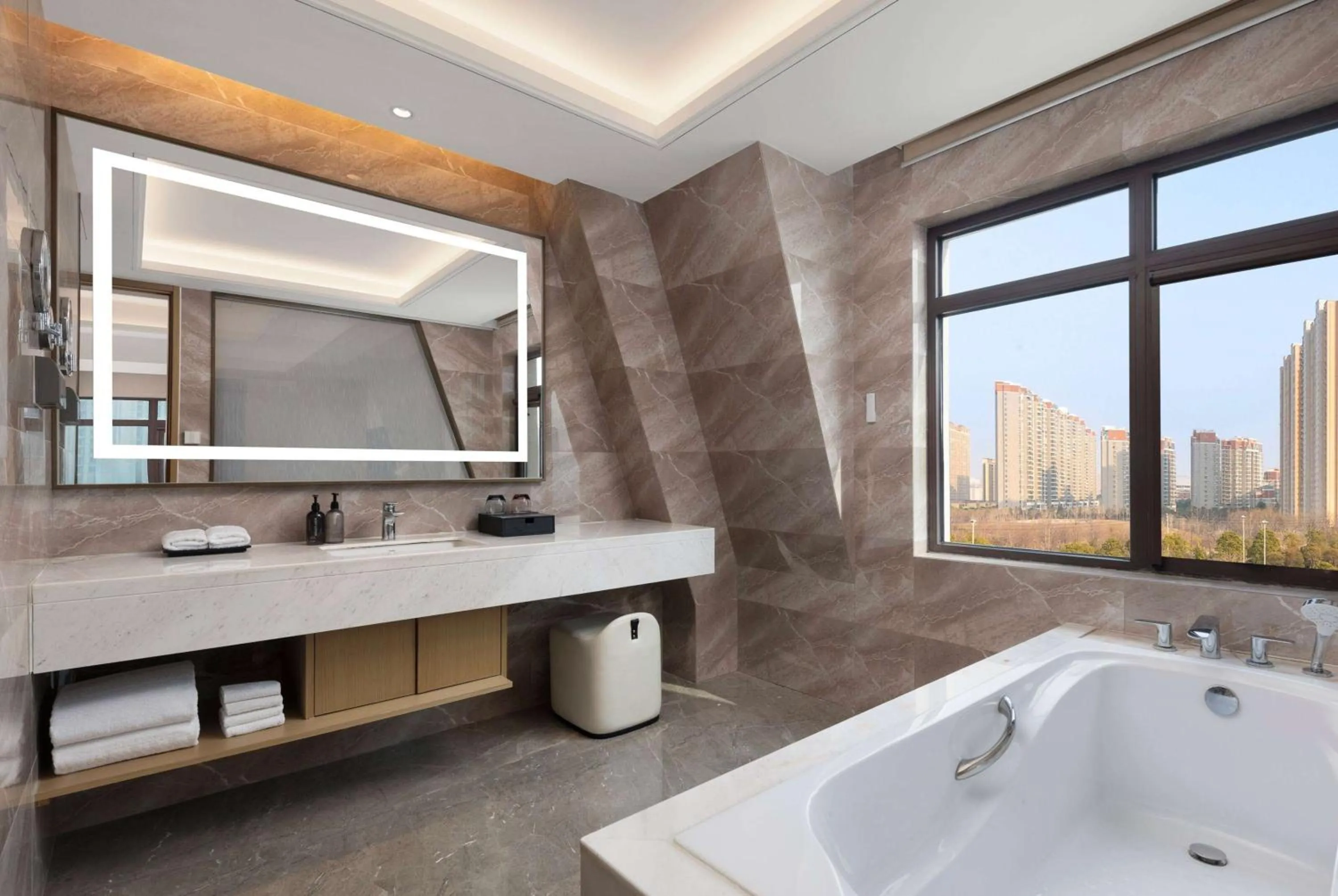 Bathroom in Ramada by Wyndham Zhumadian West Station