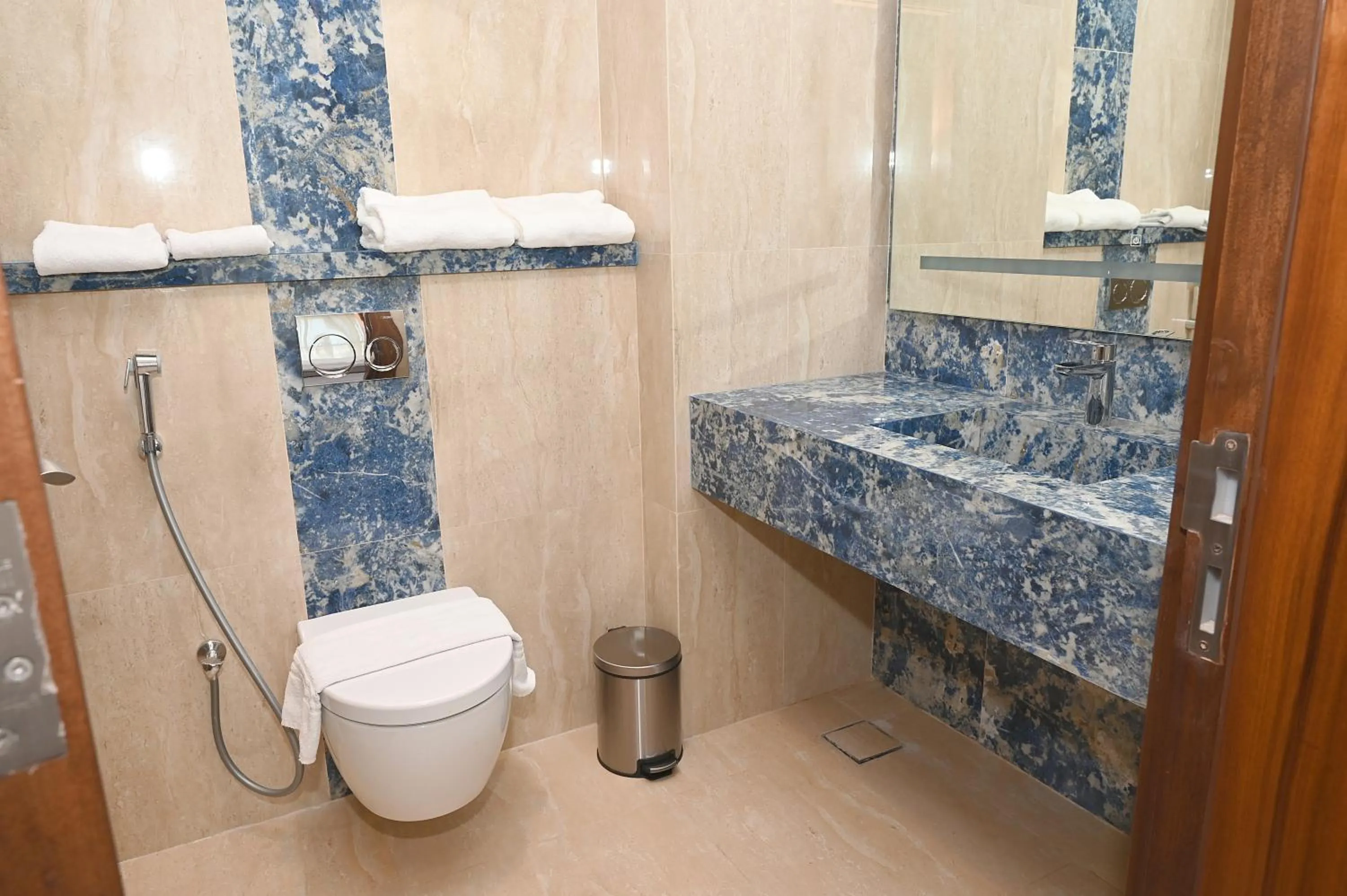 Toilet in Peninsula Worth Hotel