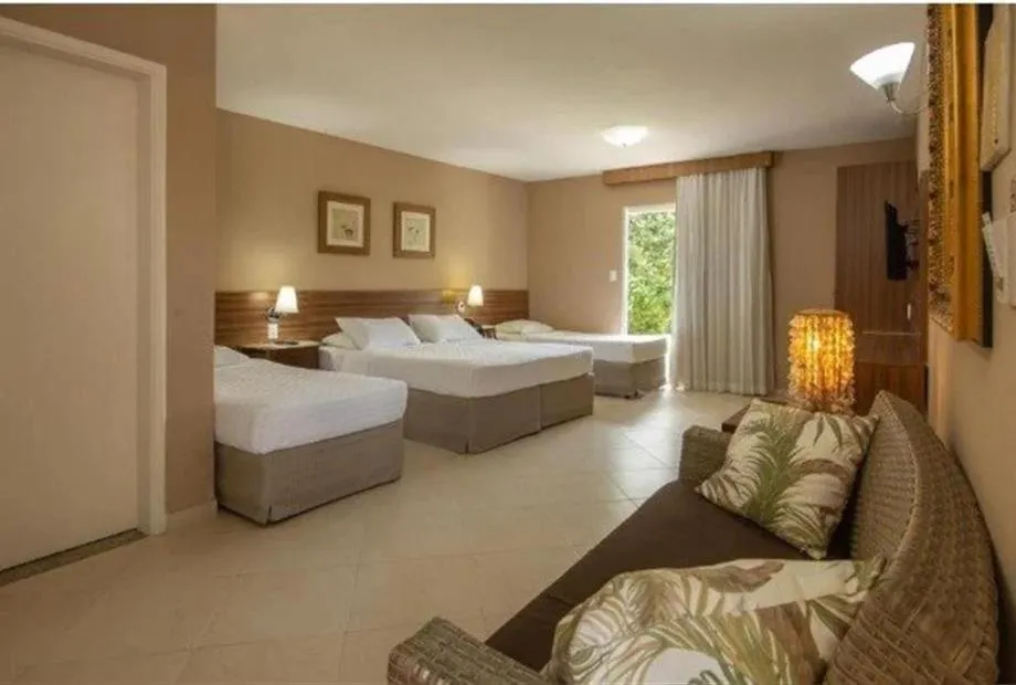 Bed in Hotel Coral Beach