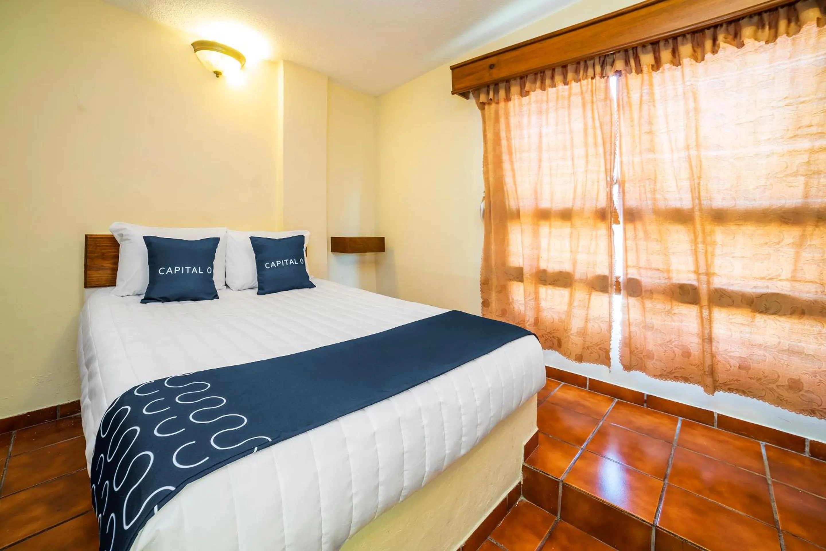 Bedroom, Bed in Capital O Hotel Casa Blanca