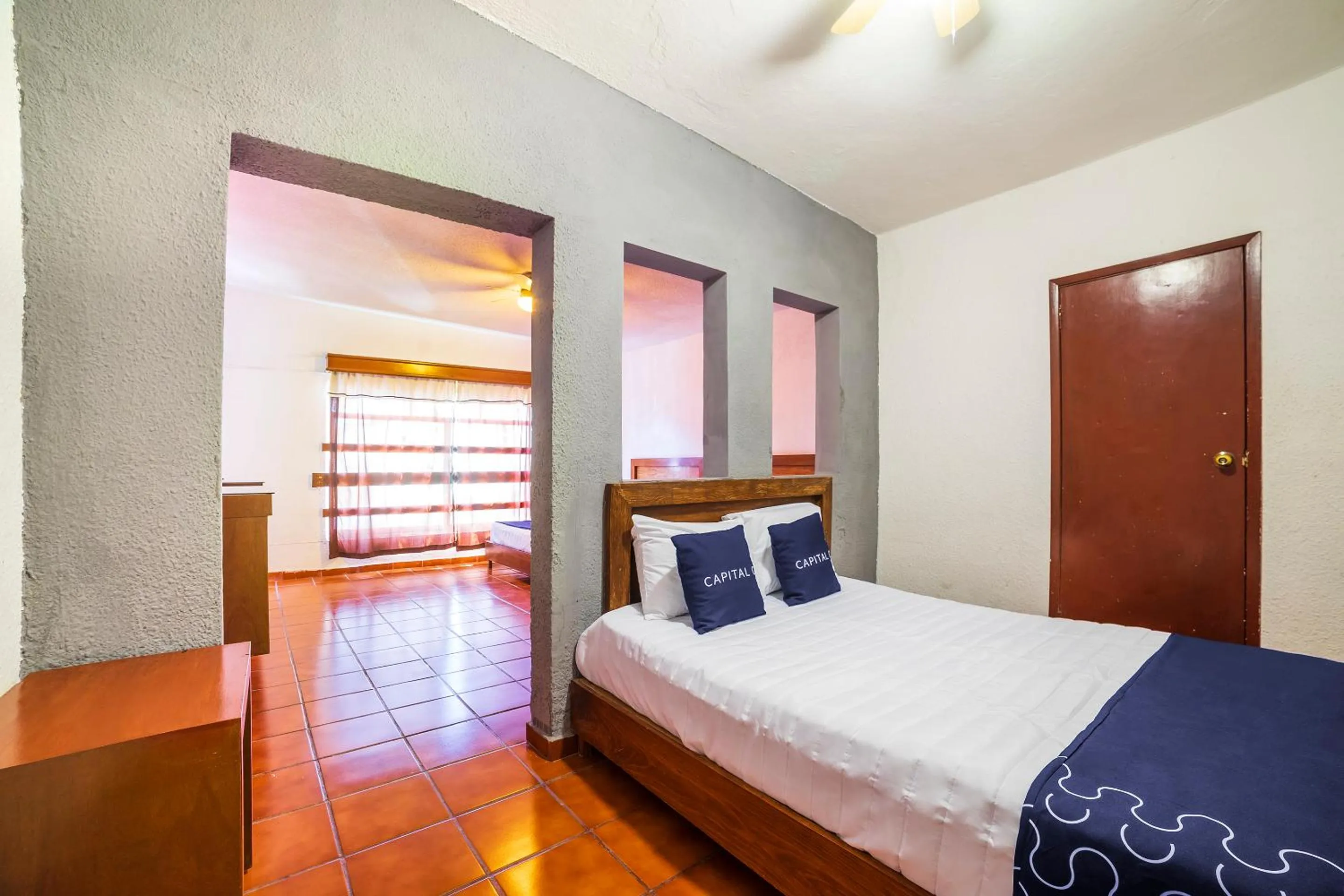 Bedroom, Bed in Capital O Hotel Casa Blanca