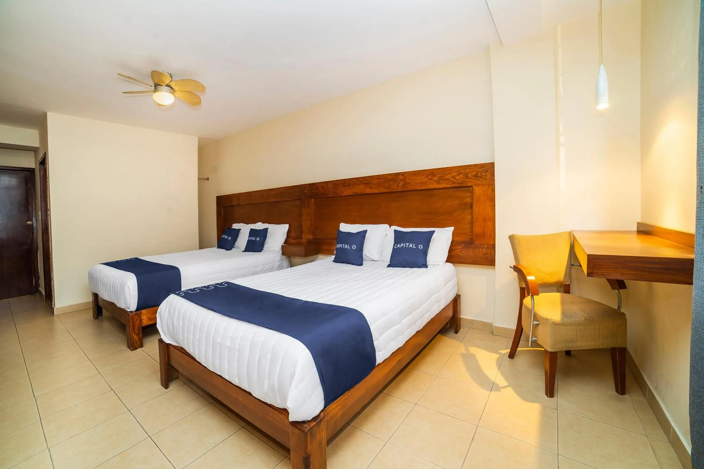 Bedroom, Bed in Capital O Hotel Casa Blanca