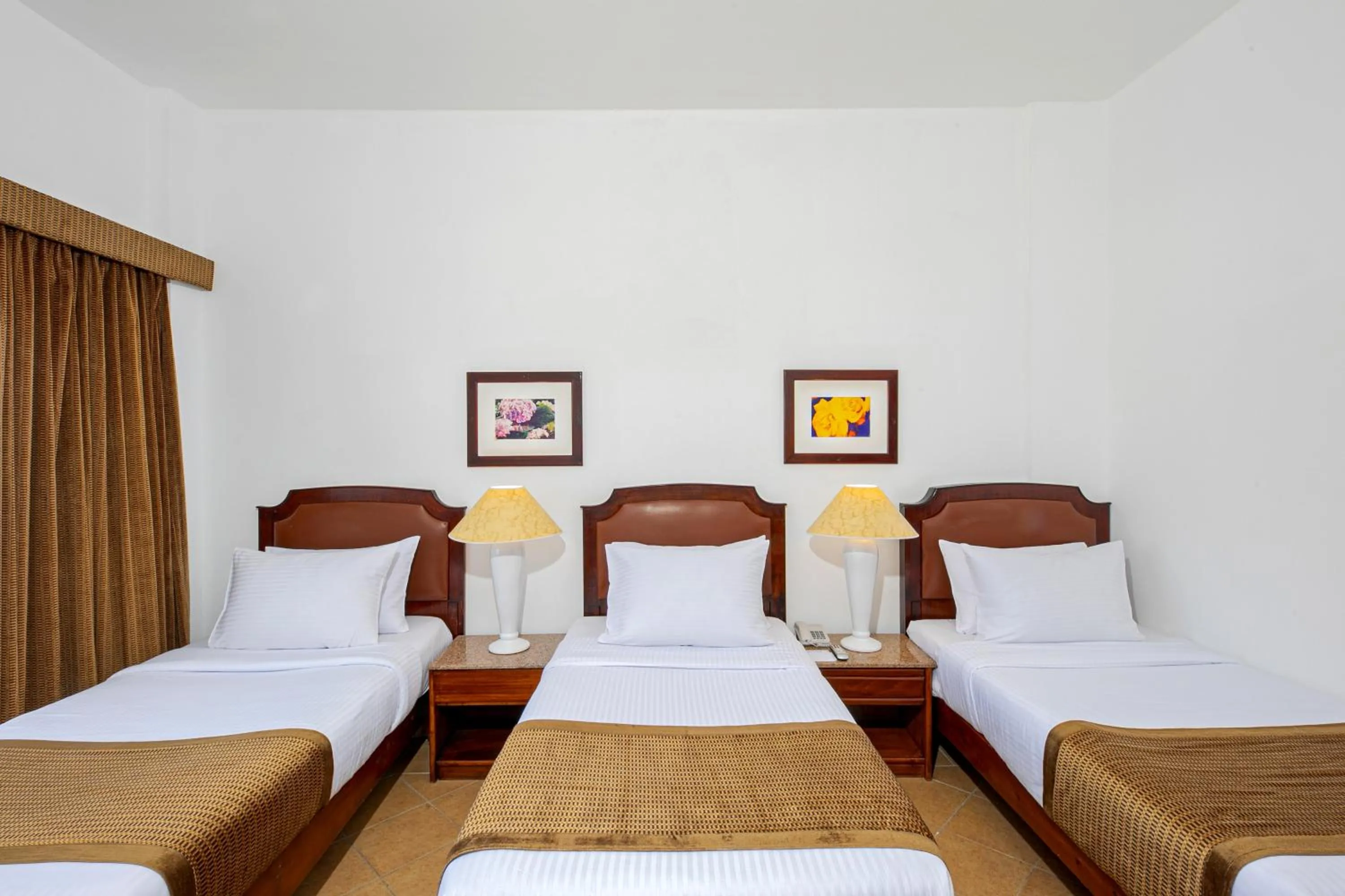 Bed in Marlin Inn Azur Resort