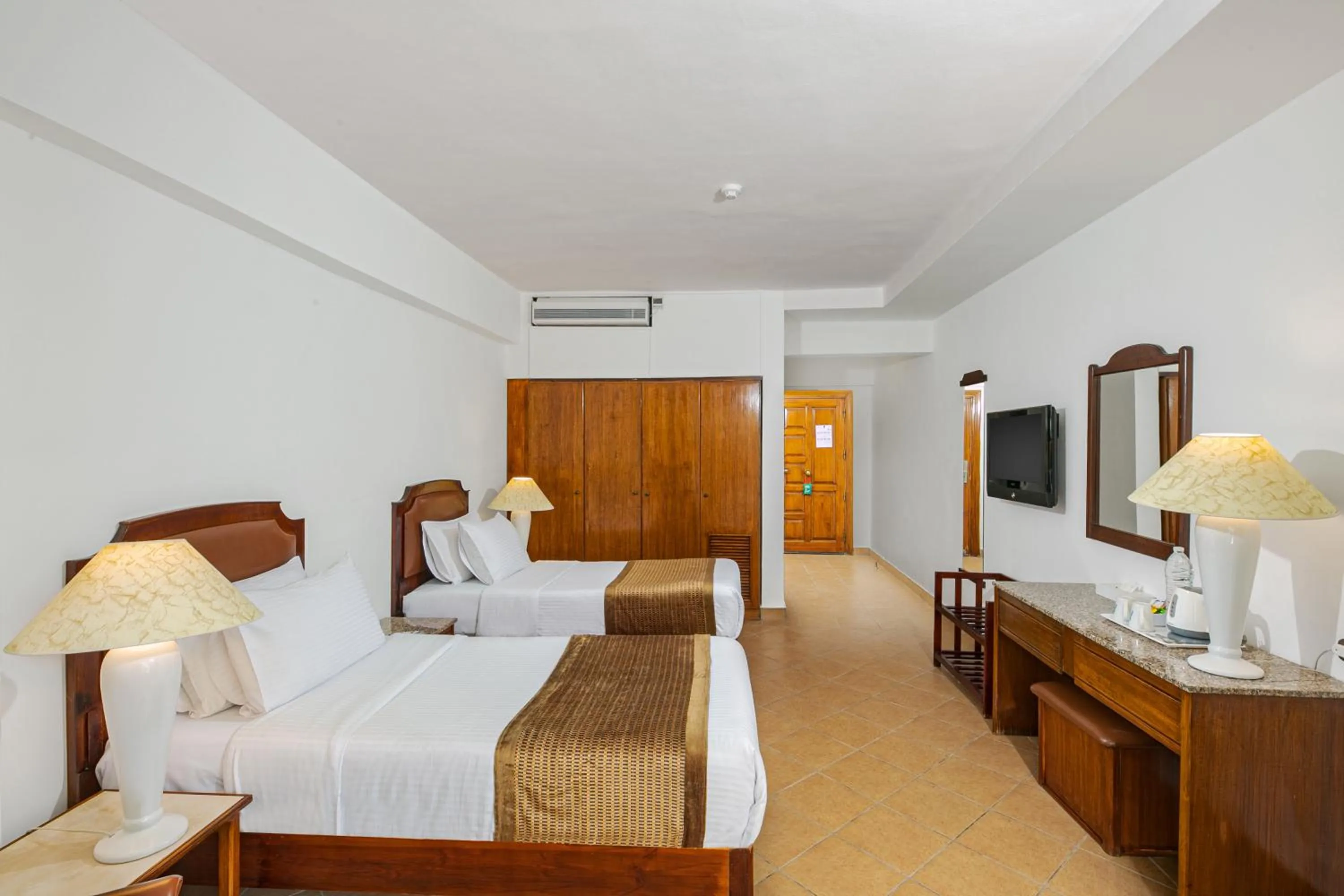 Bed in Marlin Inn Azur Resort