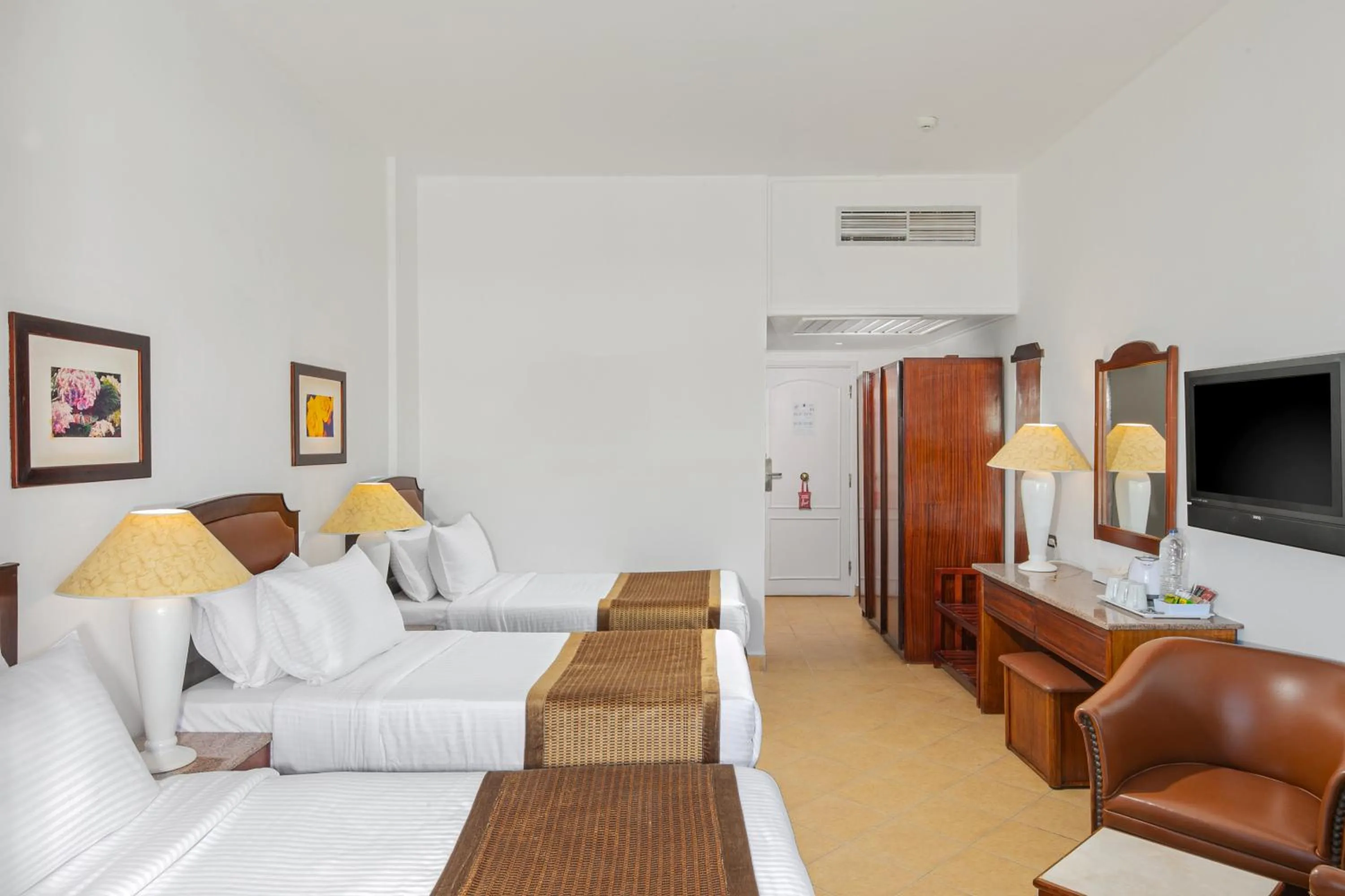 Bed in Marlin Inn Azur Resort