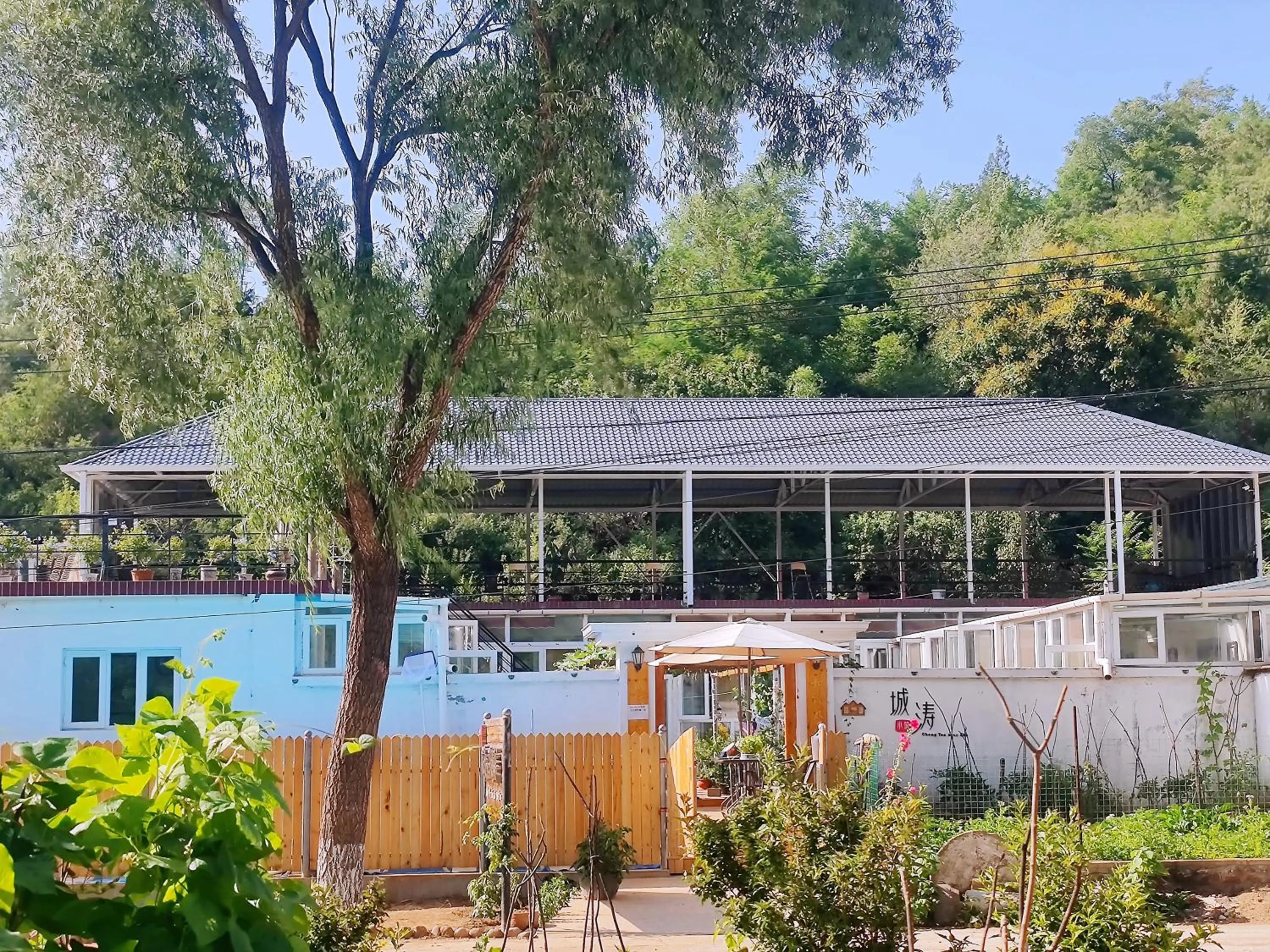Property building in Gubeikou Great Wall Chengtaoxiaozhu Boutique Homestay