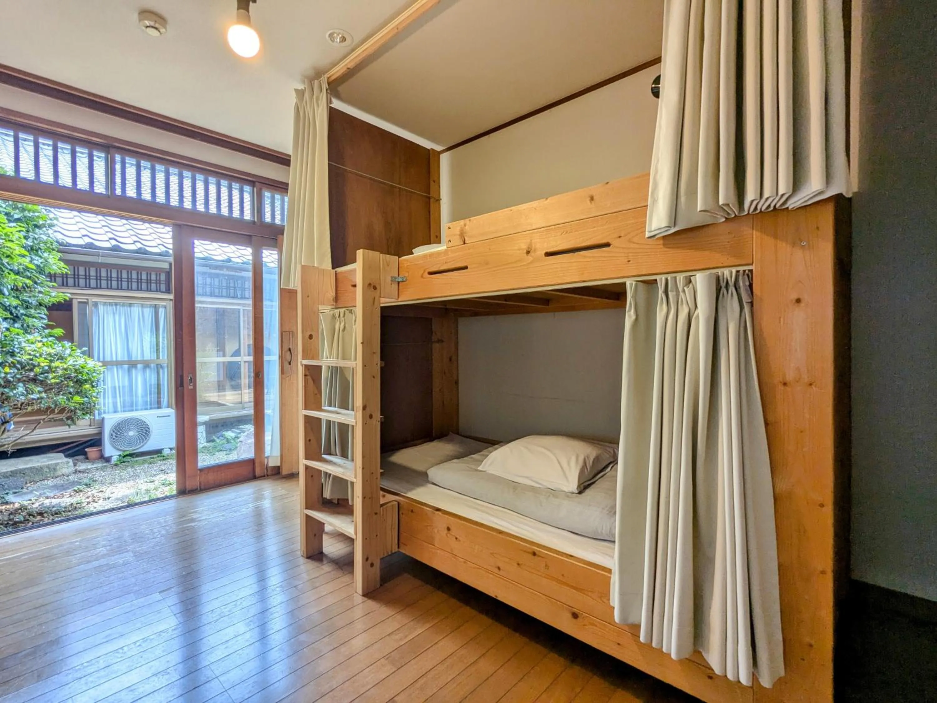 Bed in Yuzan Guesthouse