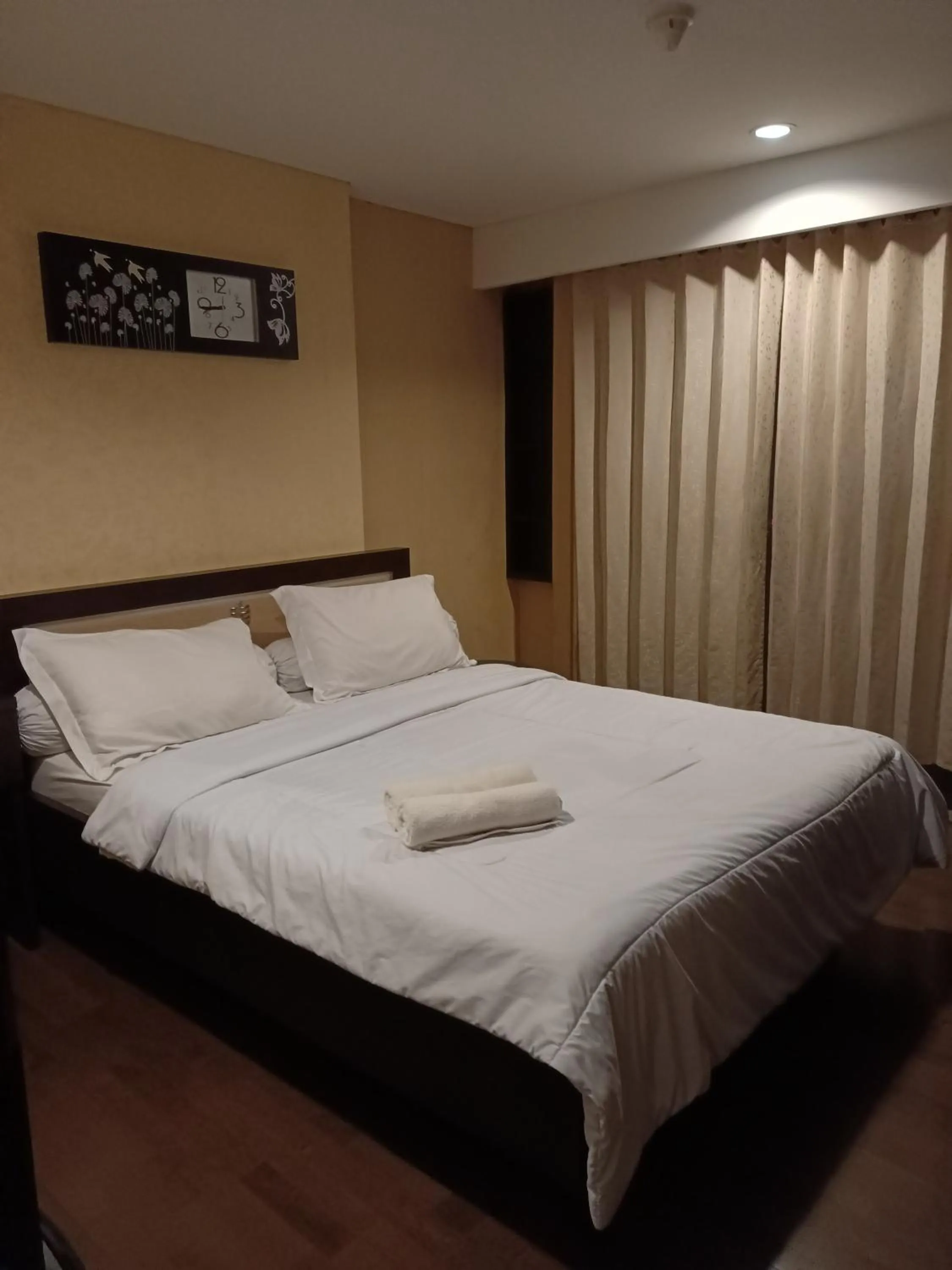 Bed in eL ROYALE by Farizi Rooms