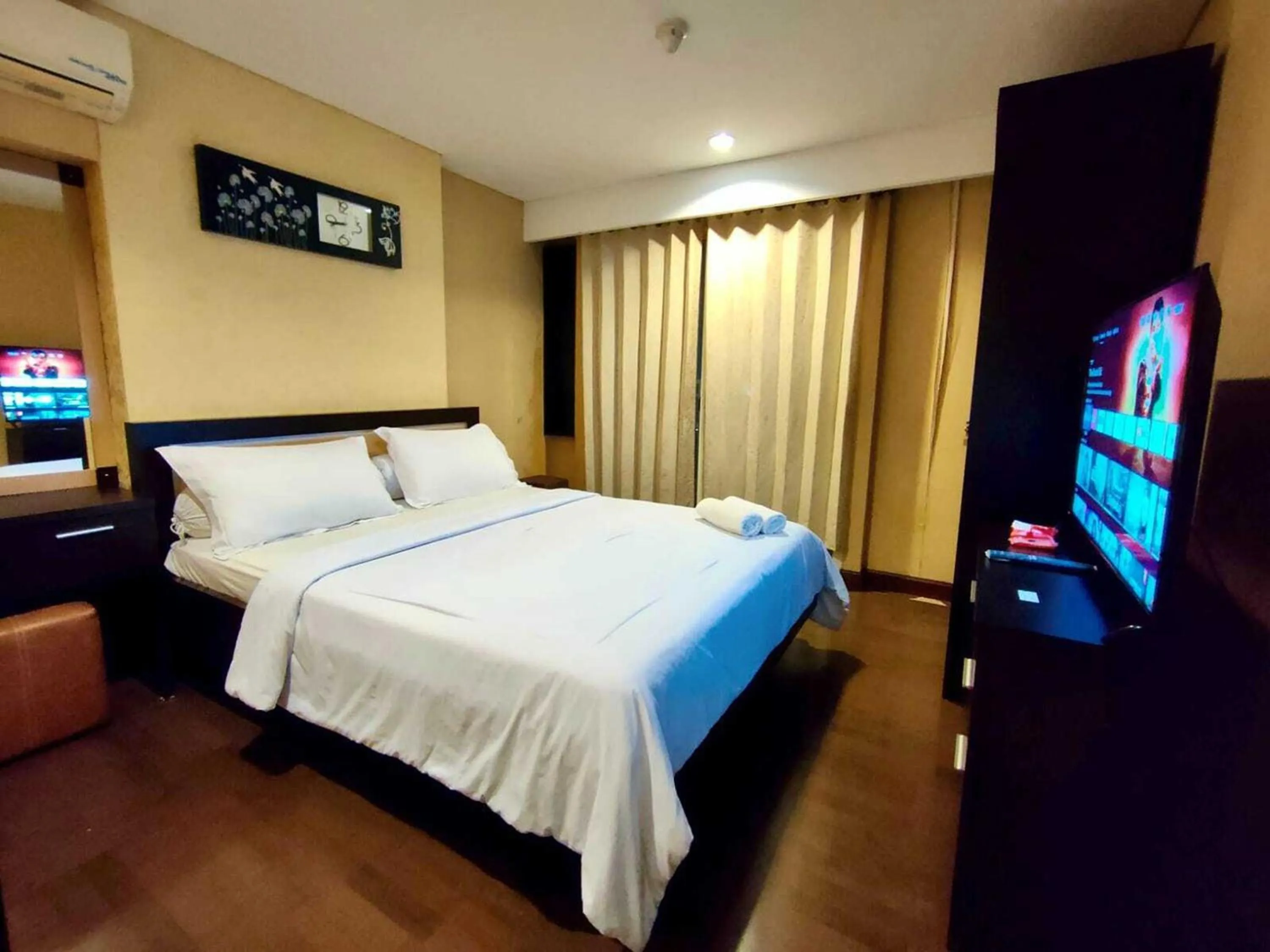 Bed in eL ROYALE by Farizi Rooms