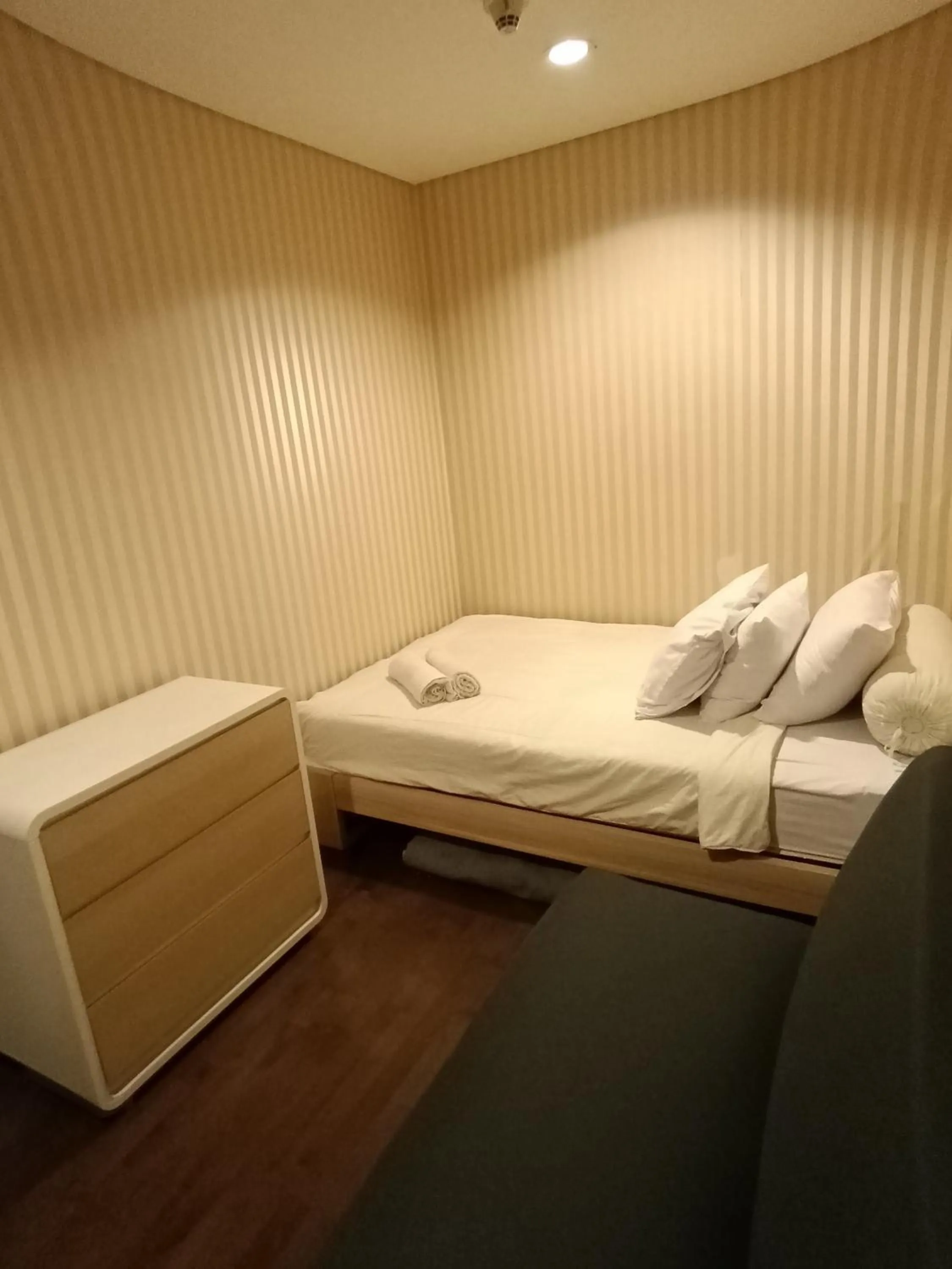 Bed in eL ROYALE by Farizi Rooms