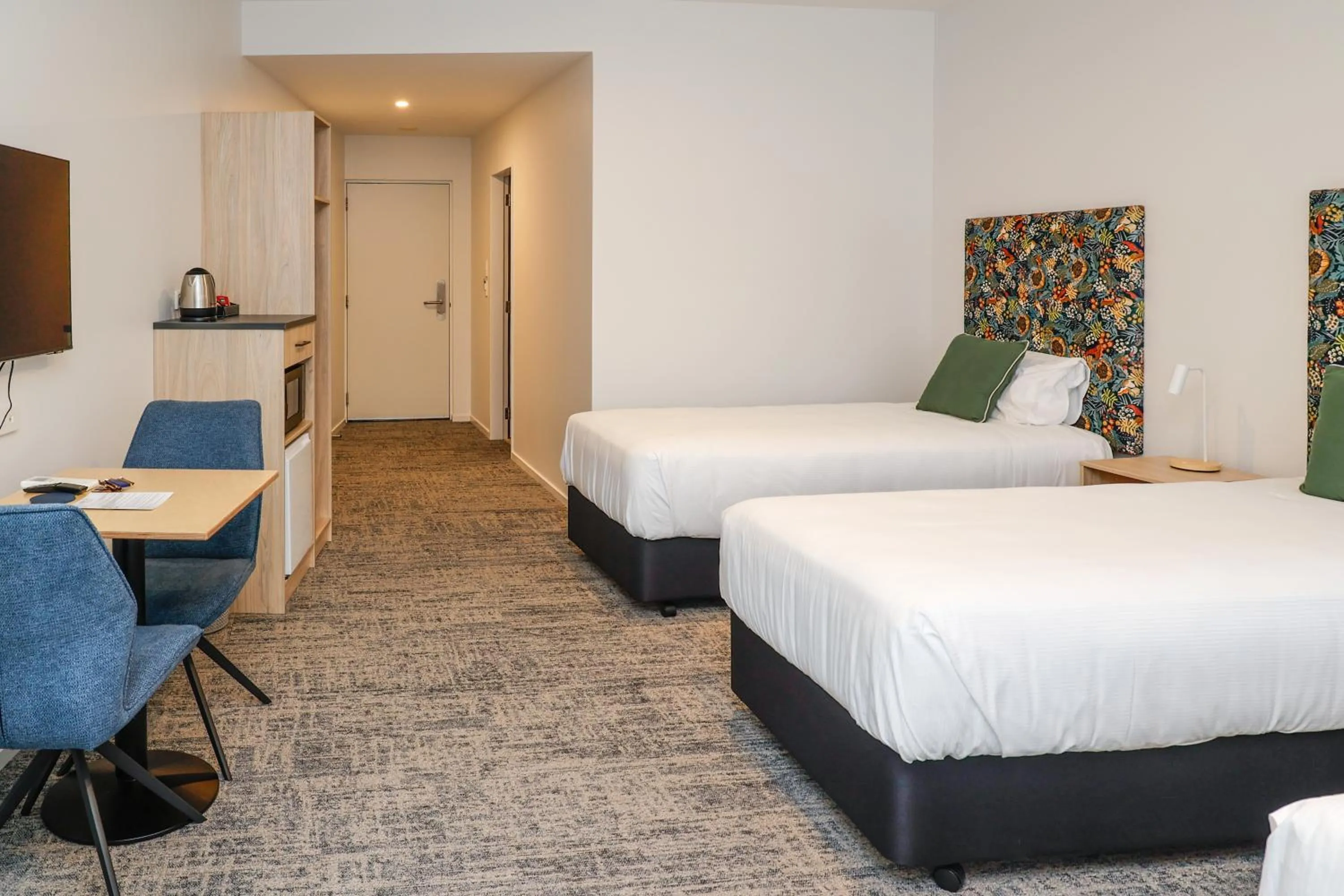 Photo of the whole room, Bed in Airport Stays