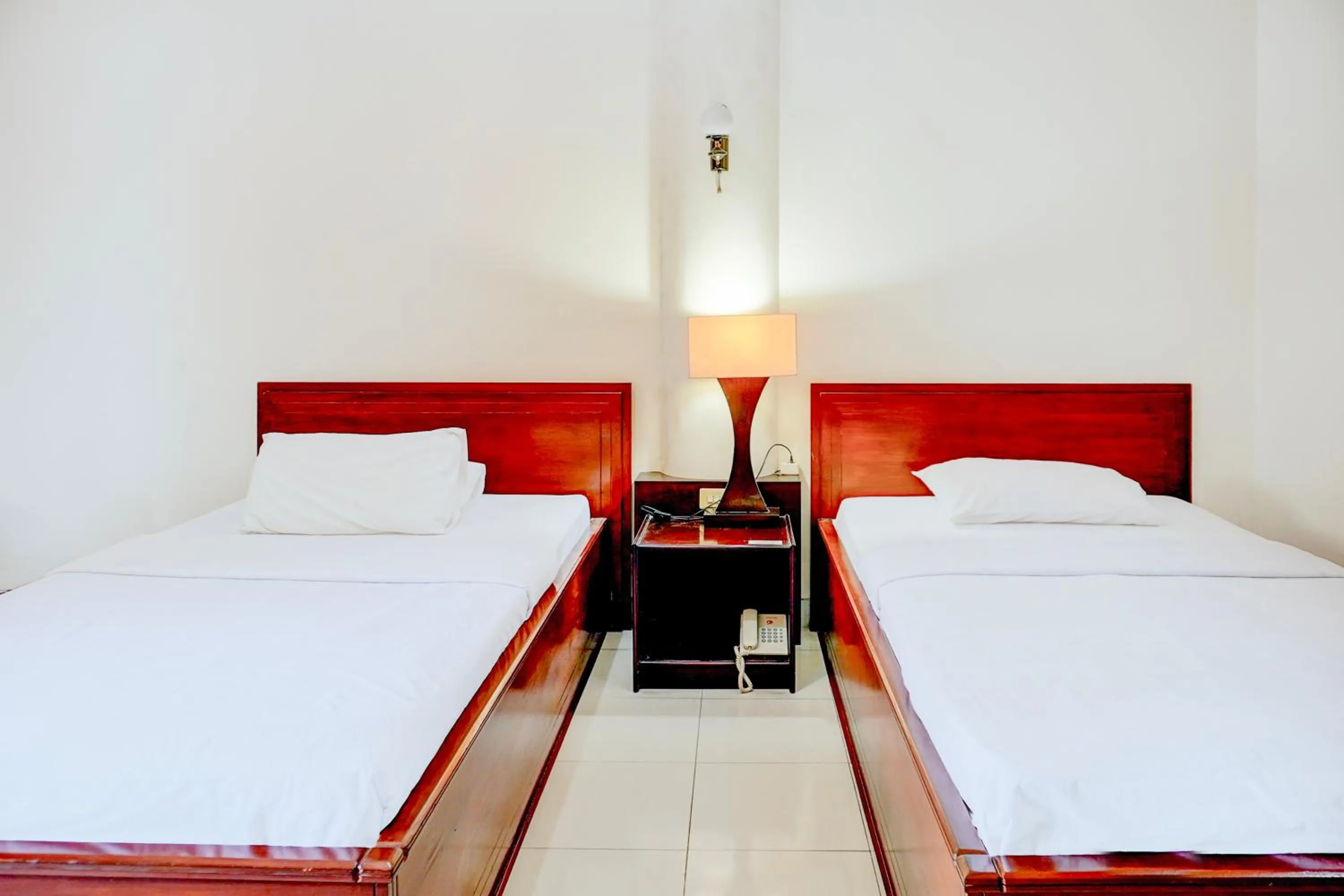 Bed in Collection O Pekalongan Near Pasar Batik Setono Formerly Hotel Jayadipa