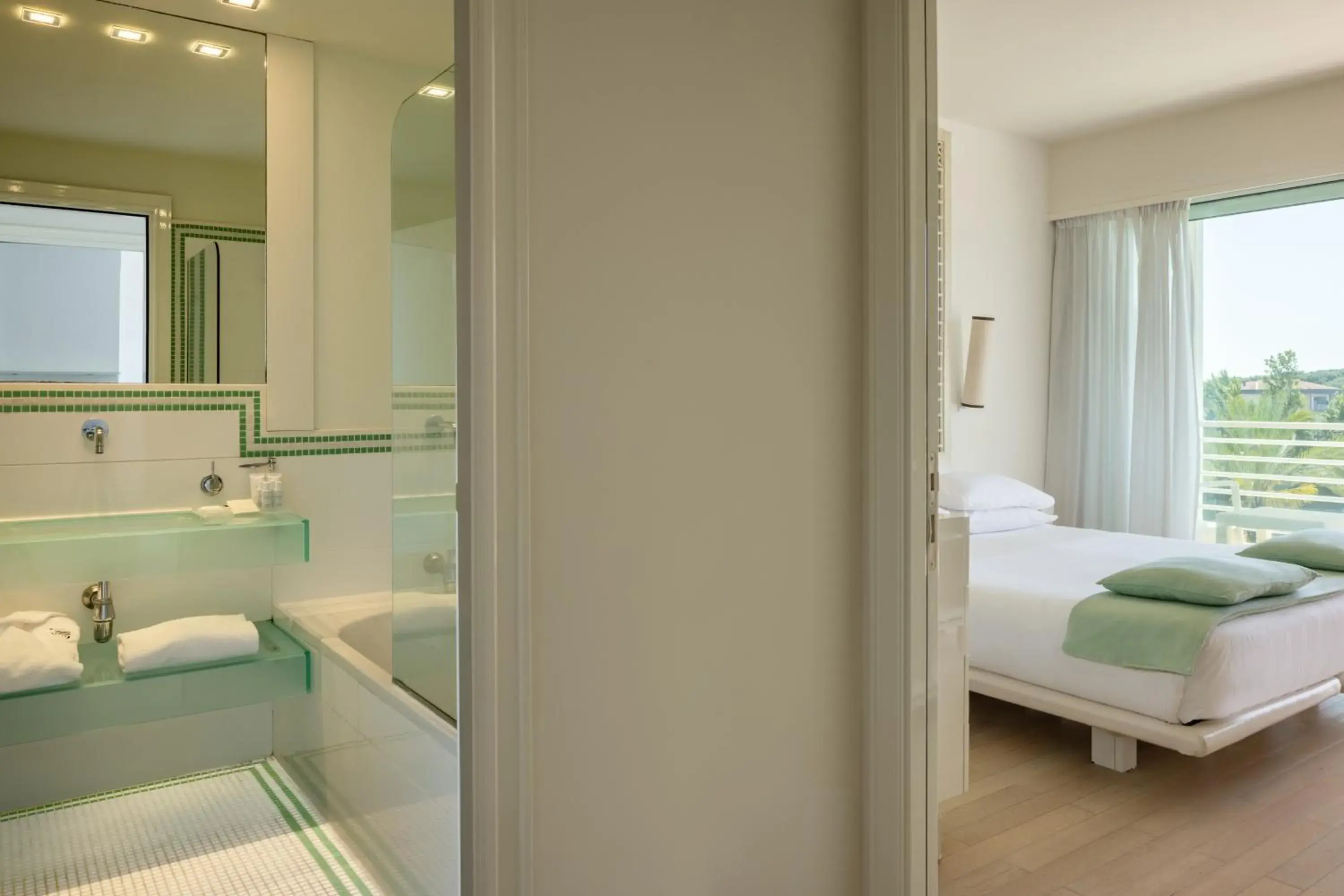 Bedroom, Bed in Versilia Lido | UNA Esperienze Bedroom, Bed in Versilia Lido | UNA Esperienze