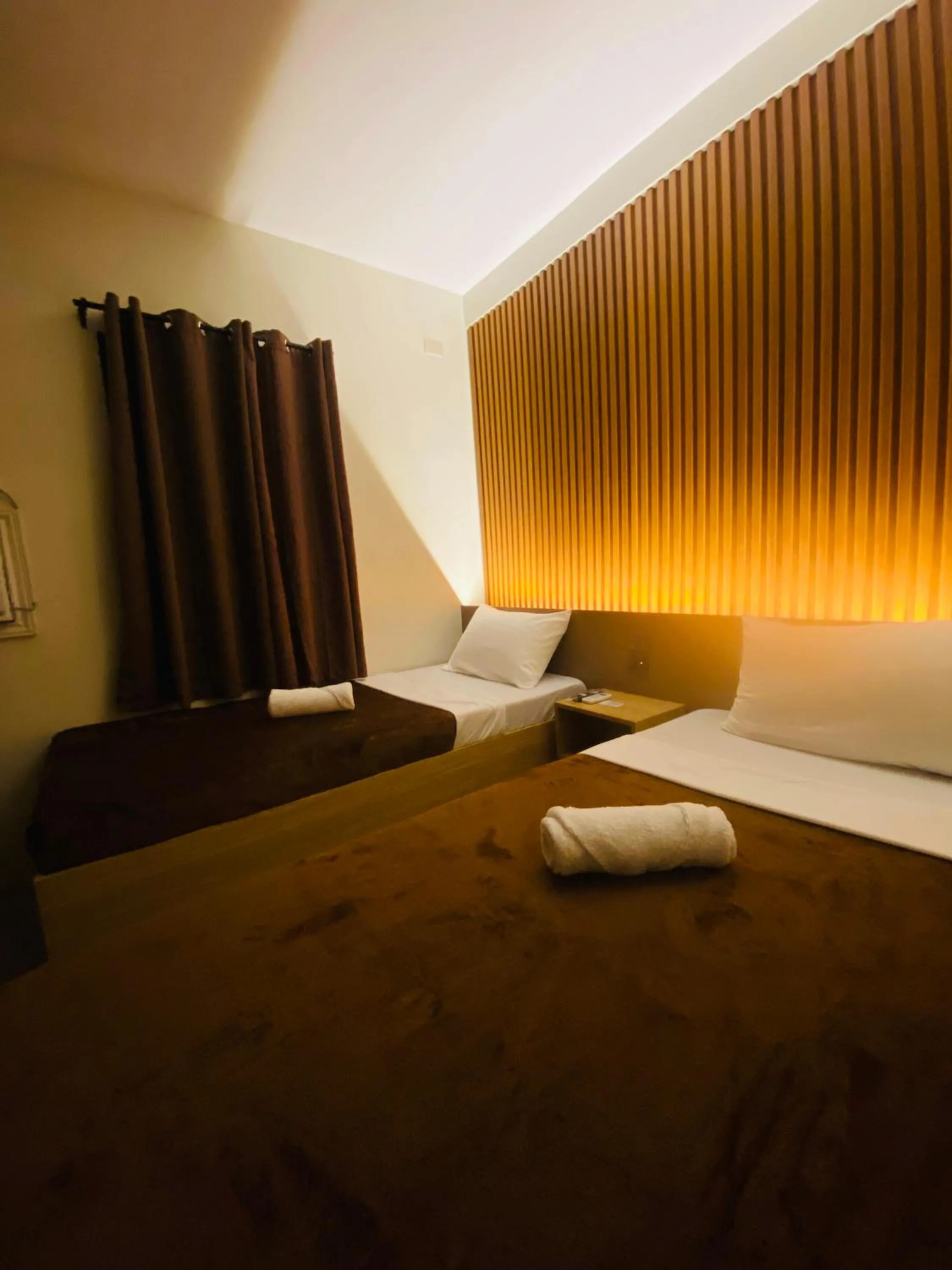 Bed in ZenSuites Hotel Tacloban