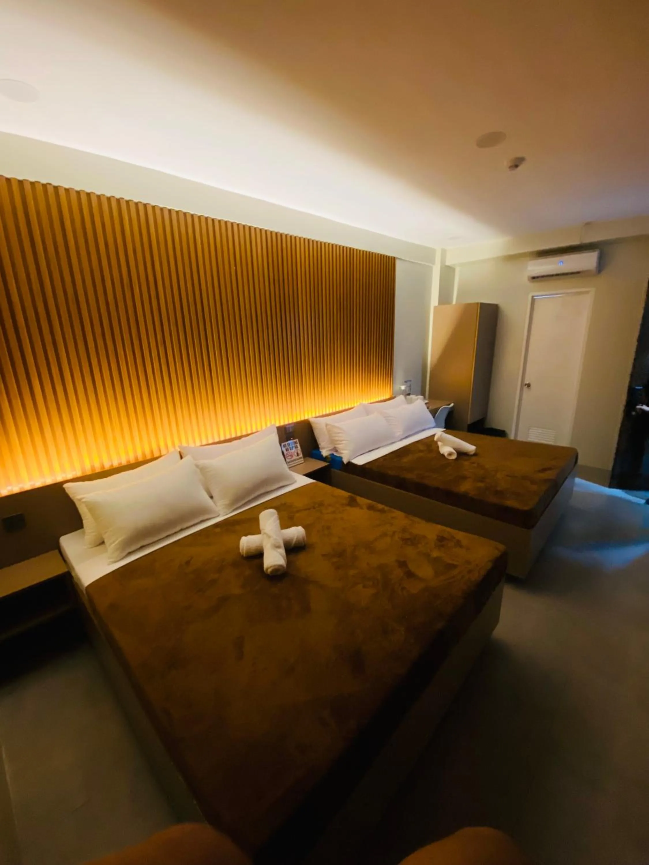 Bed in ZenSuites Hotel Tacloban