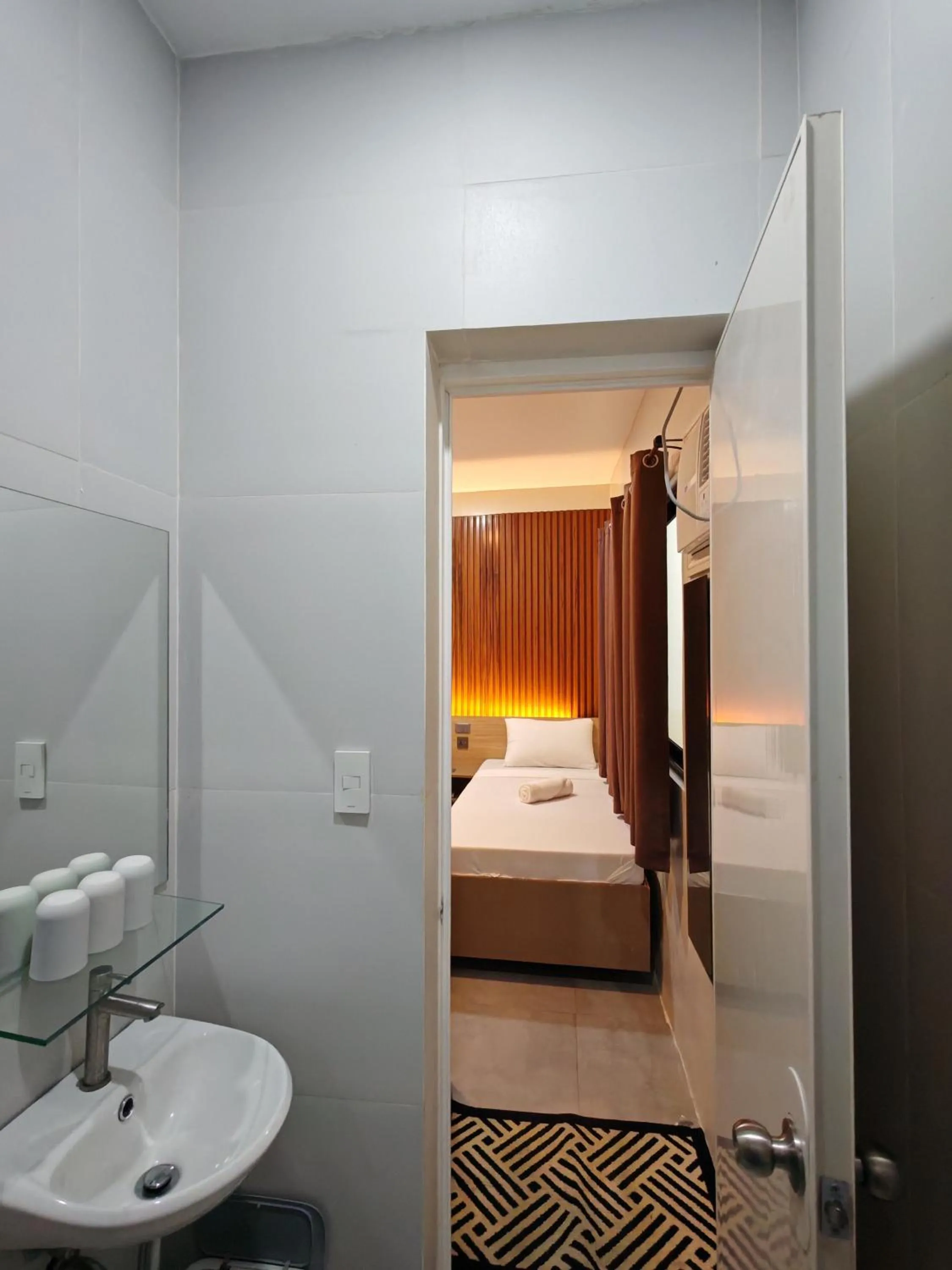 Bed in ZenSuites Hotel Tacloban