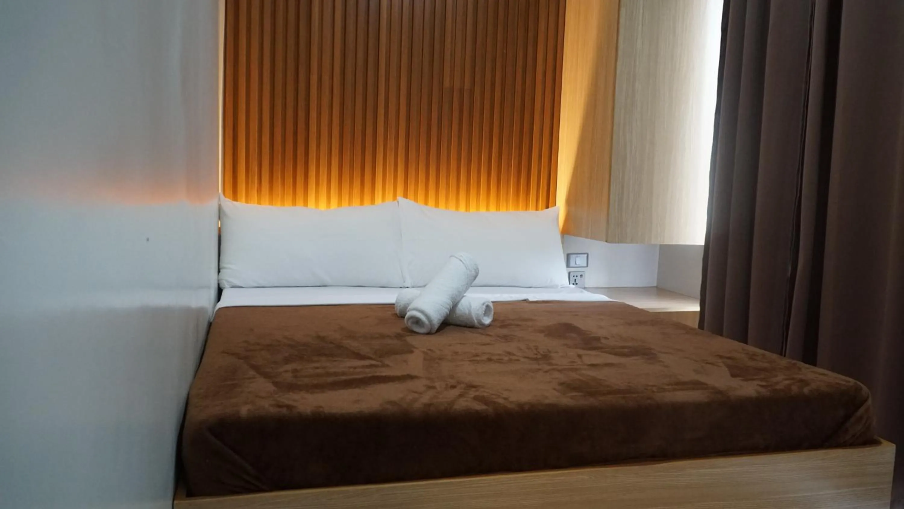 Bed in ZenSuites Hotel Tacloban