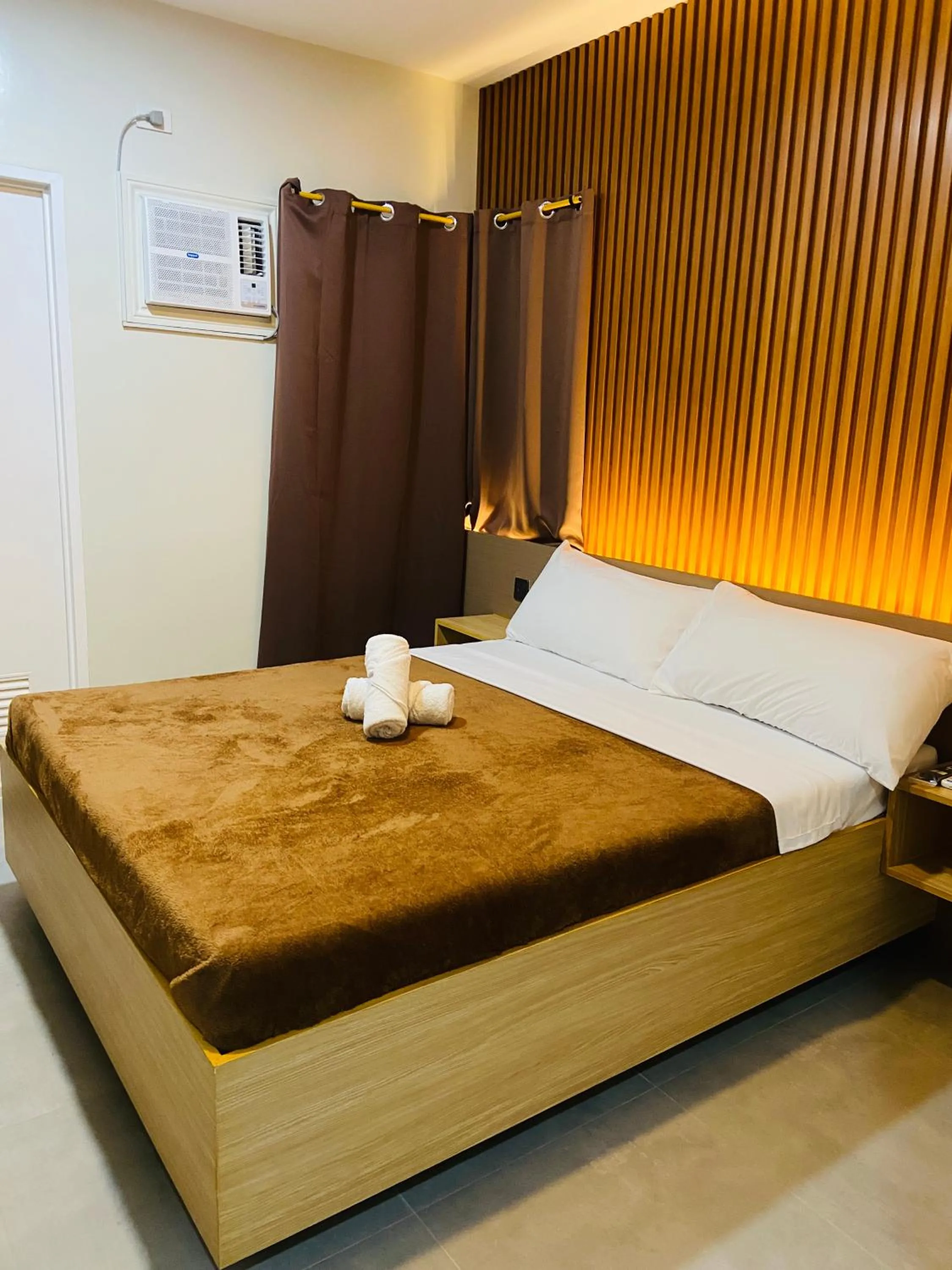 Bed in ZenSuites Hotel Tacloban