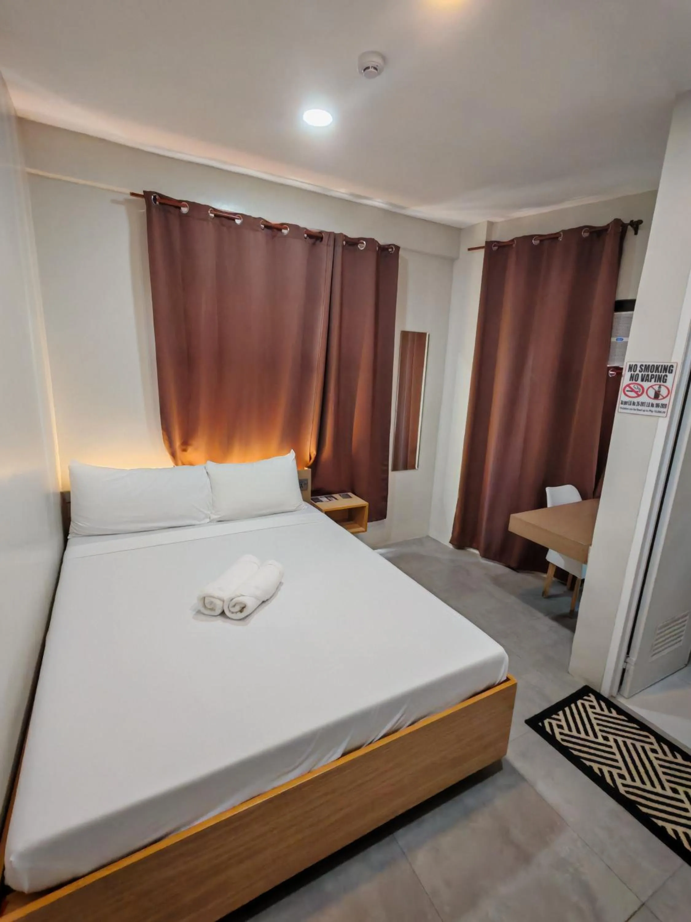 Bed in ZenSuites Hotel Tacloban