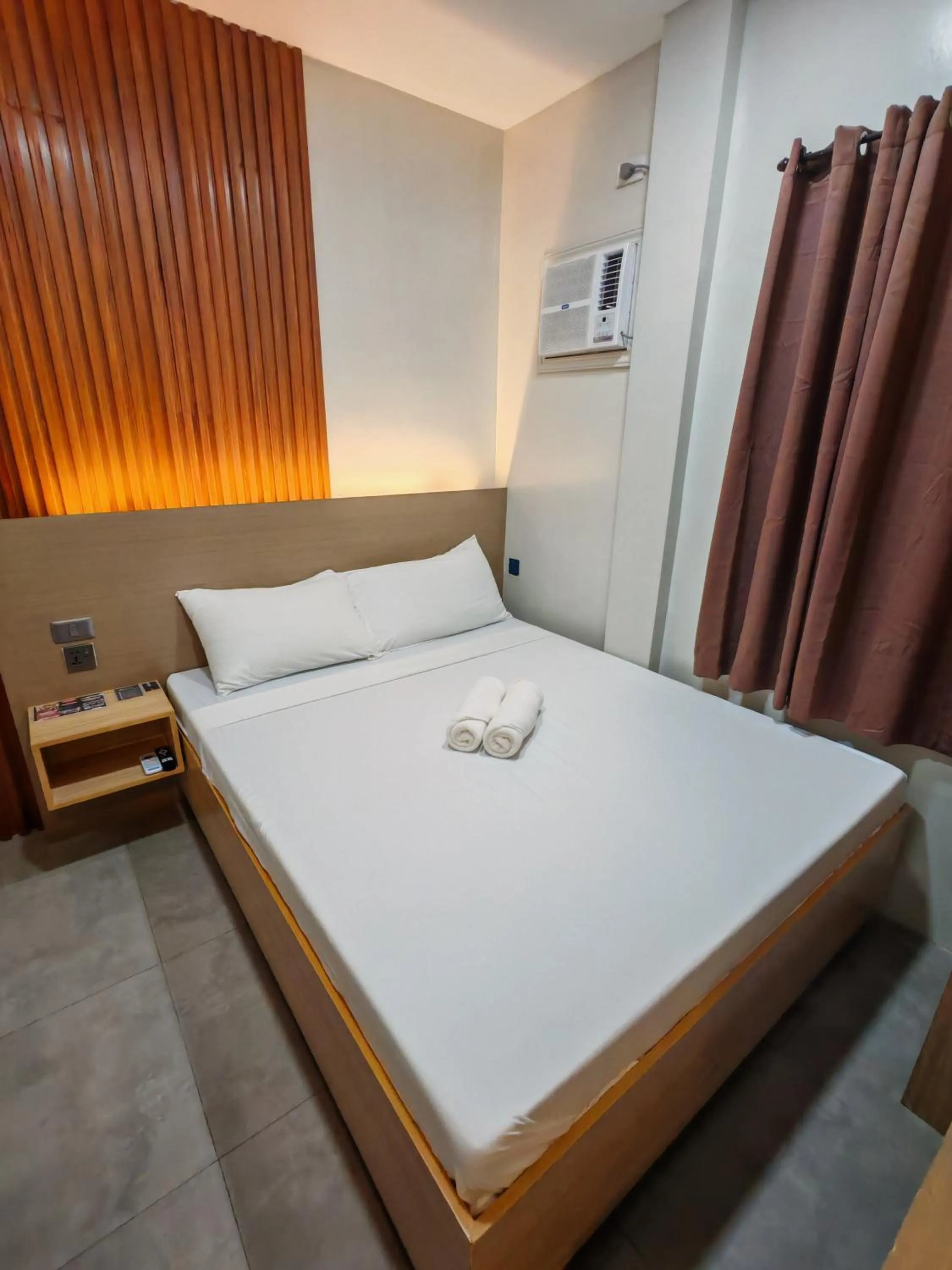 Bed in ZenSuites Hotel Tacloban
