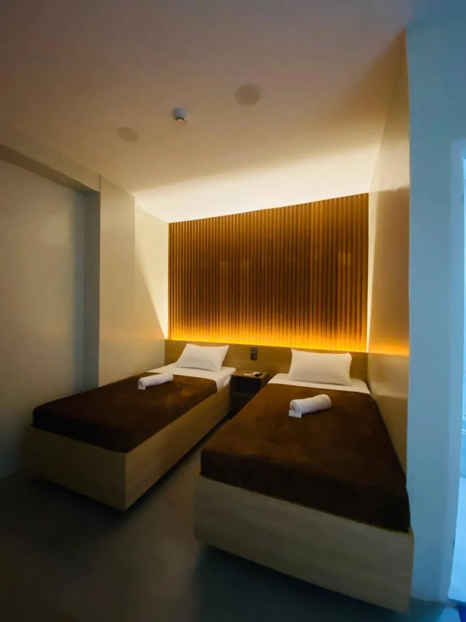 Bed in ZenSuites Hotel Tacloban