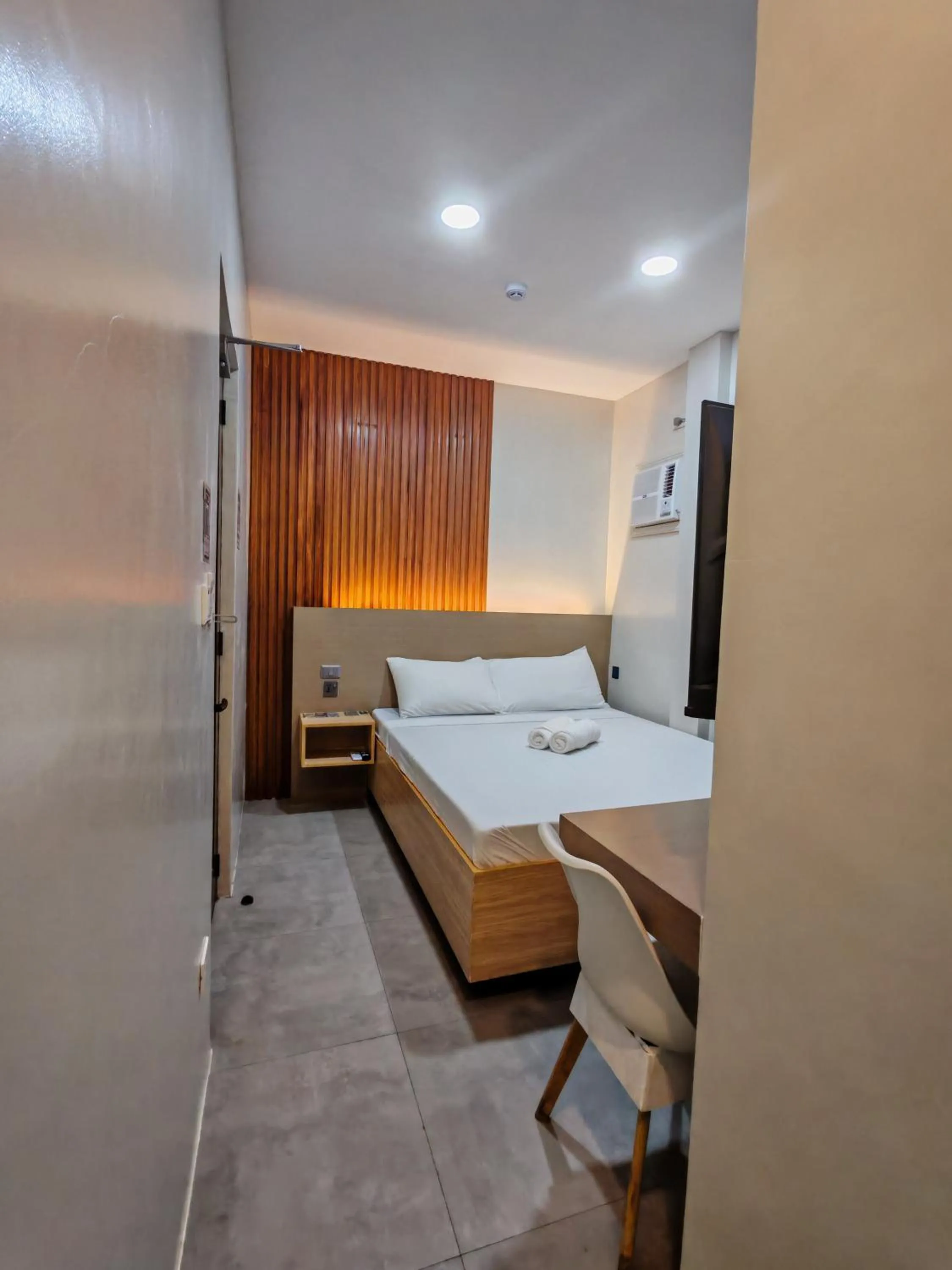 Bed in ZenSuites Hotel Tacloban