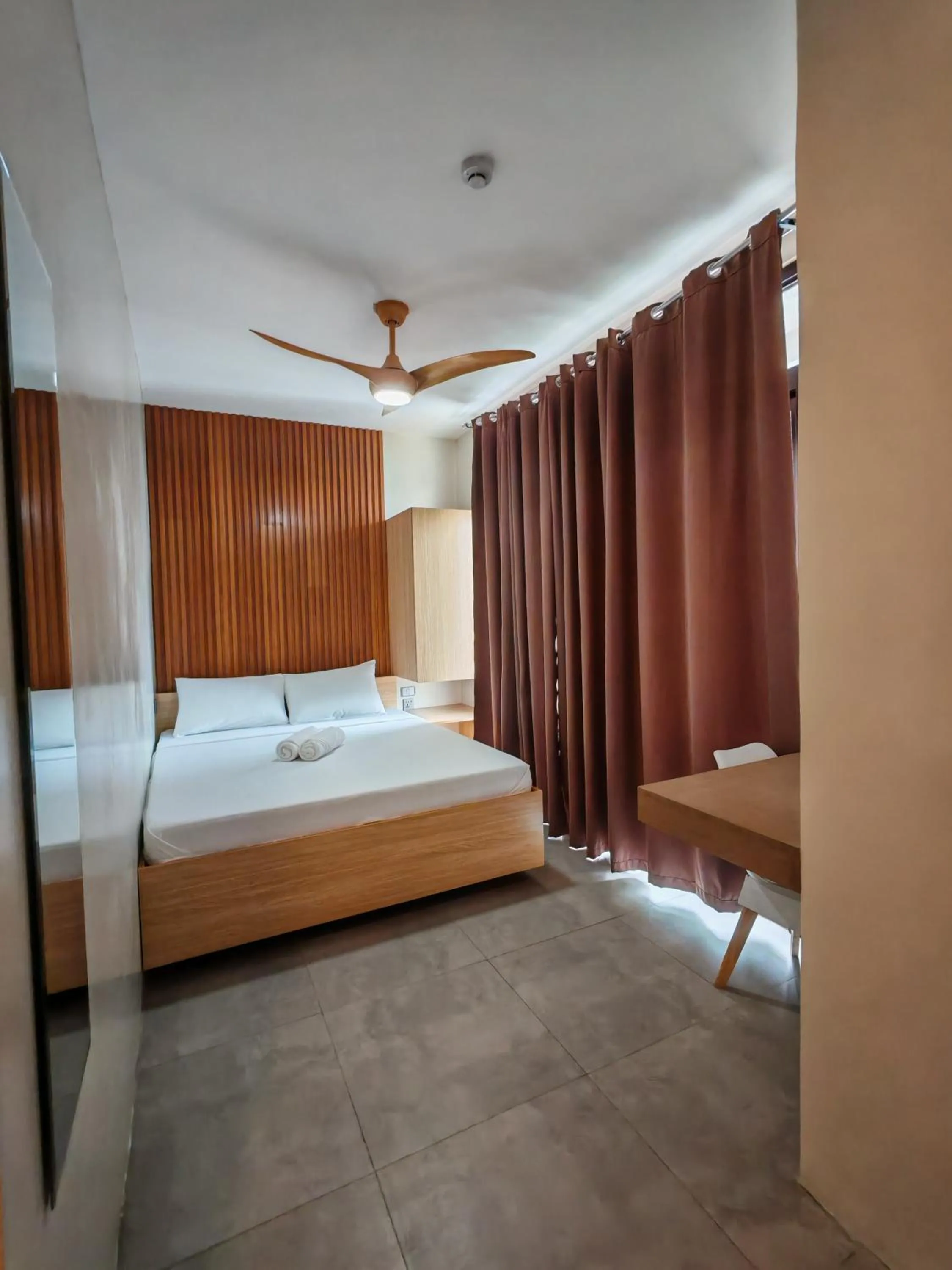 Bed in ZenSuites Hotel Tacloban