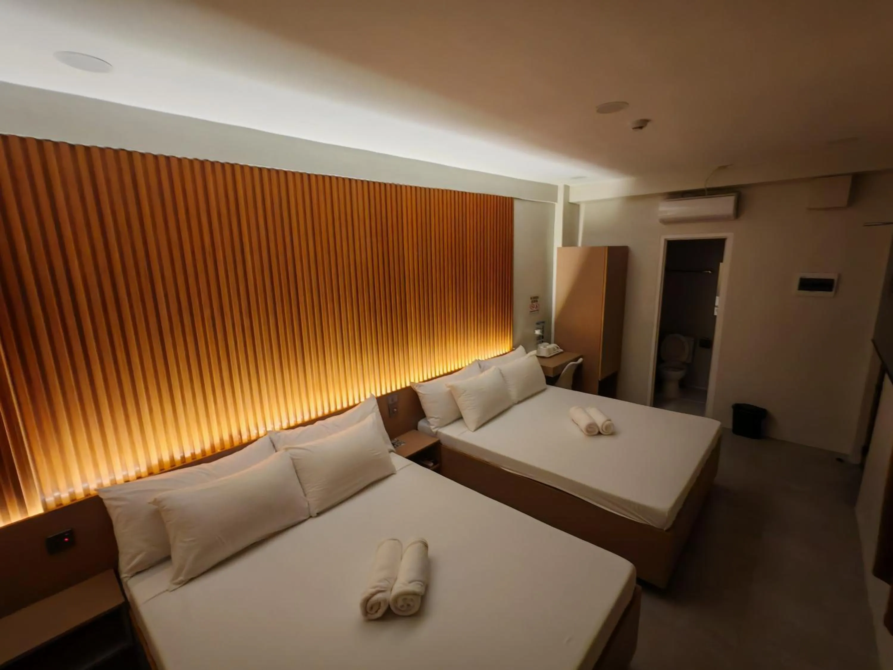 Bedroom, Bed in ZenSuites Hotel Tacloban
