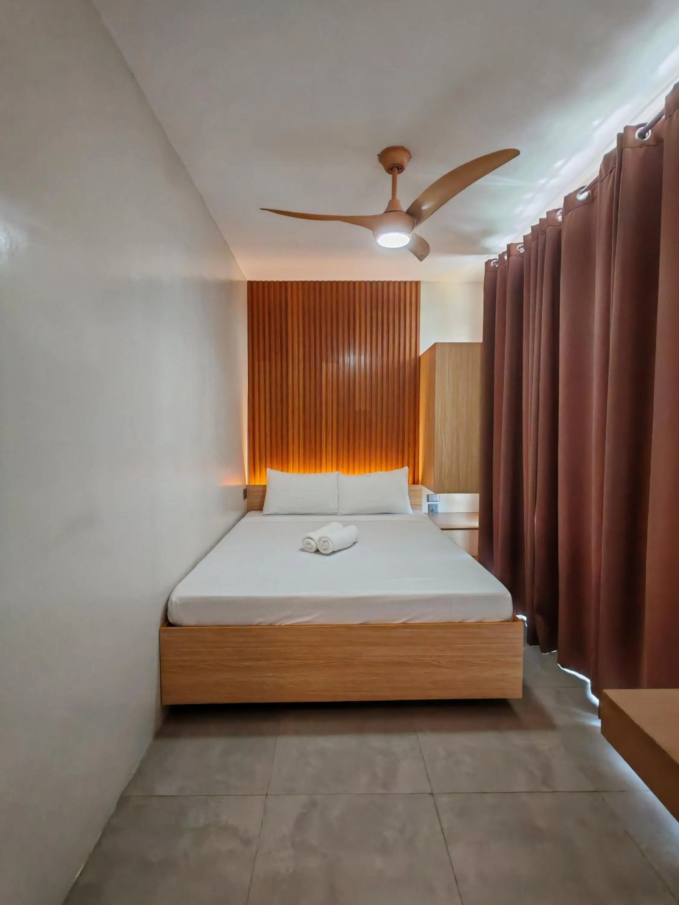 Bed in ZenSuites Hotel Tacloban