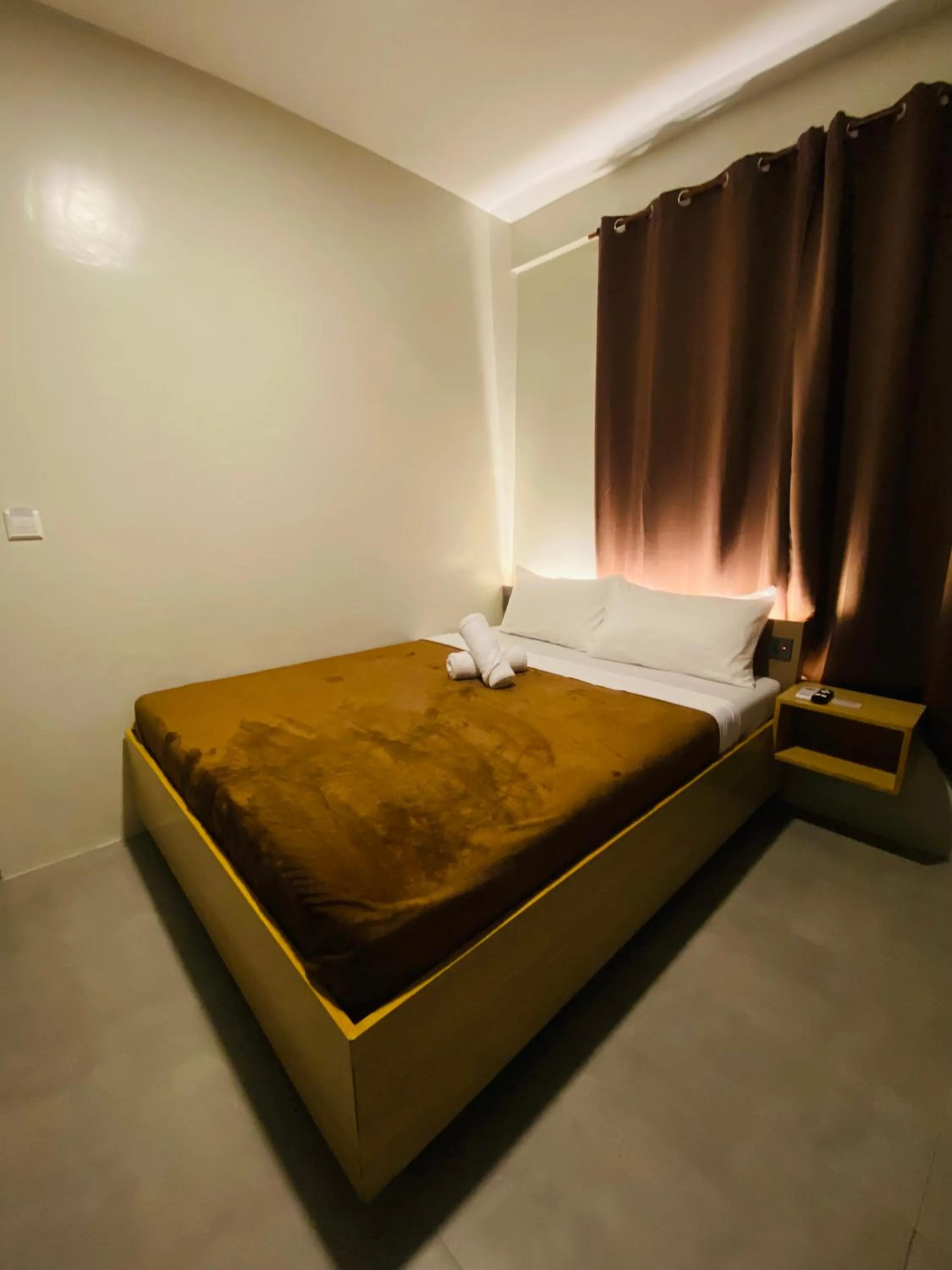 Bed in ZenSuites Hotel Tacloban