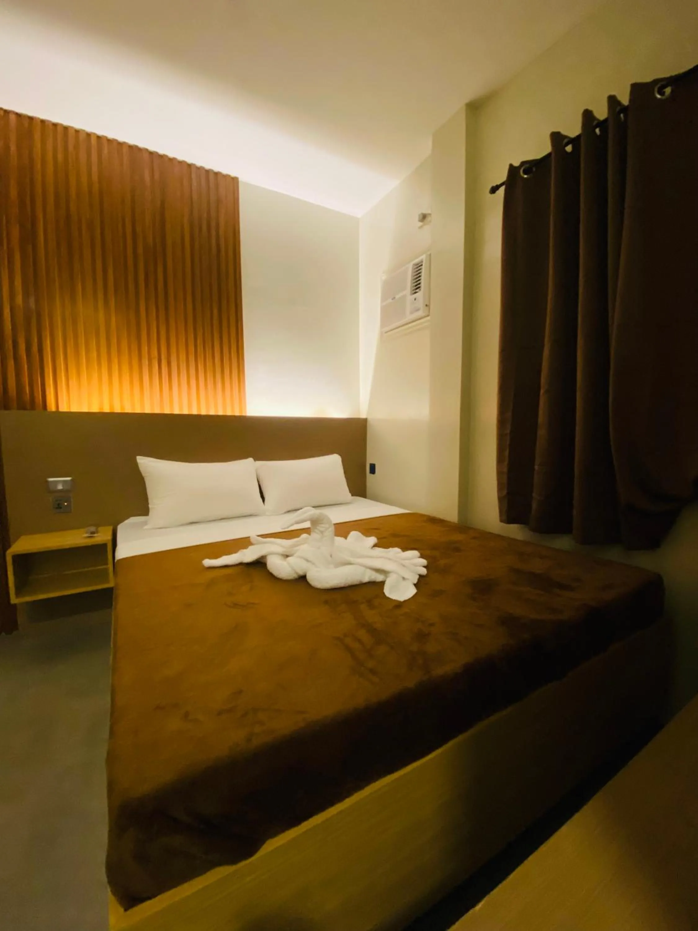 Bed in ZenSuites Hotel Tacloban