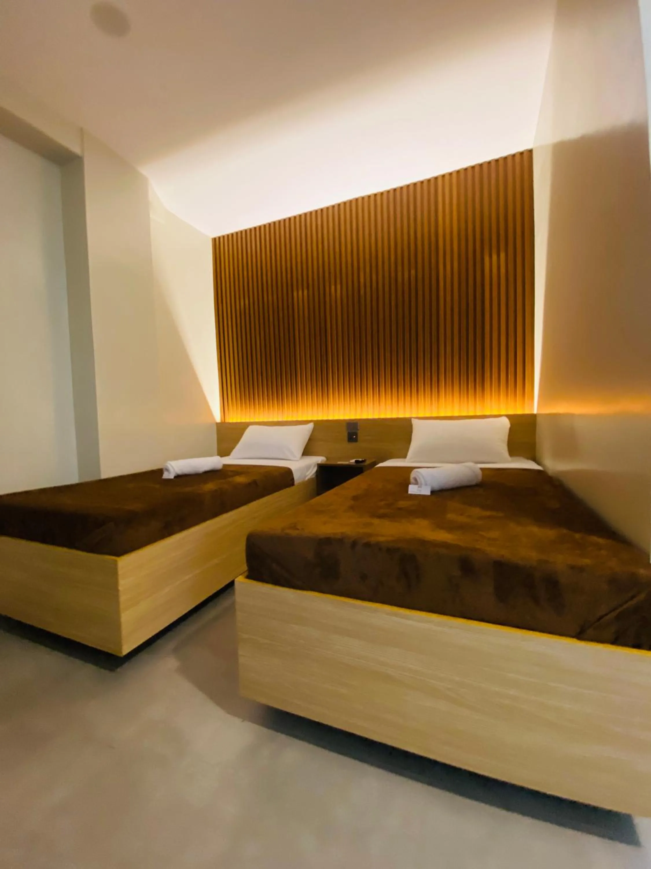 Bed in ZenSuites Hotel Tacloban