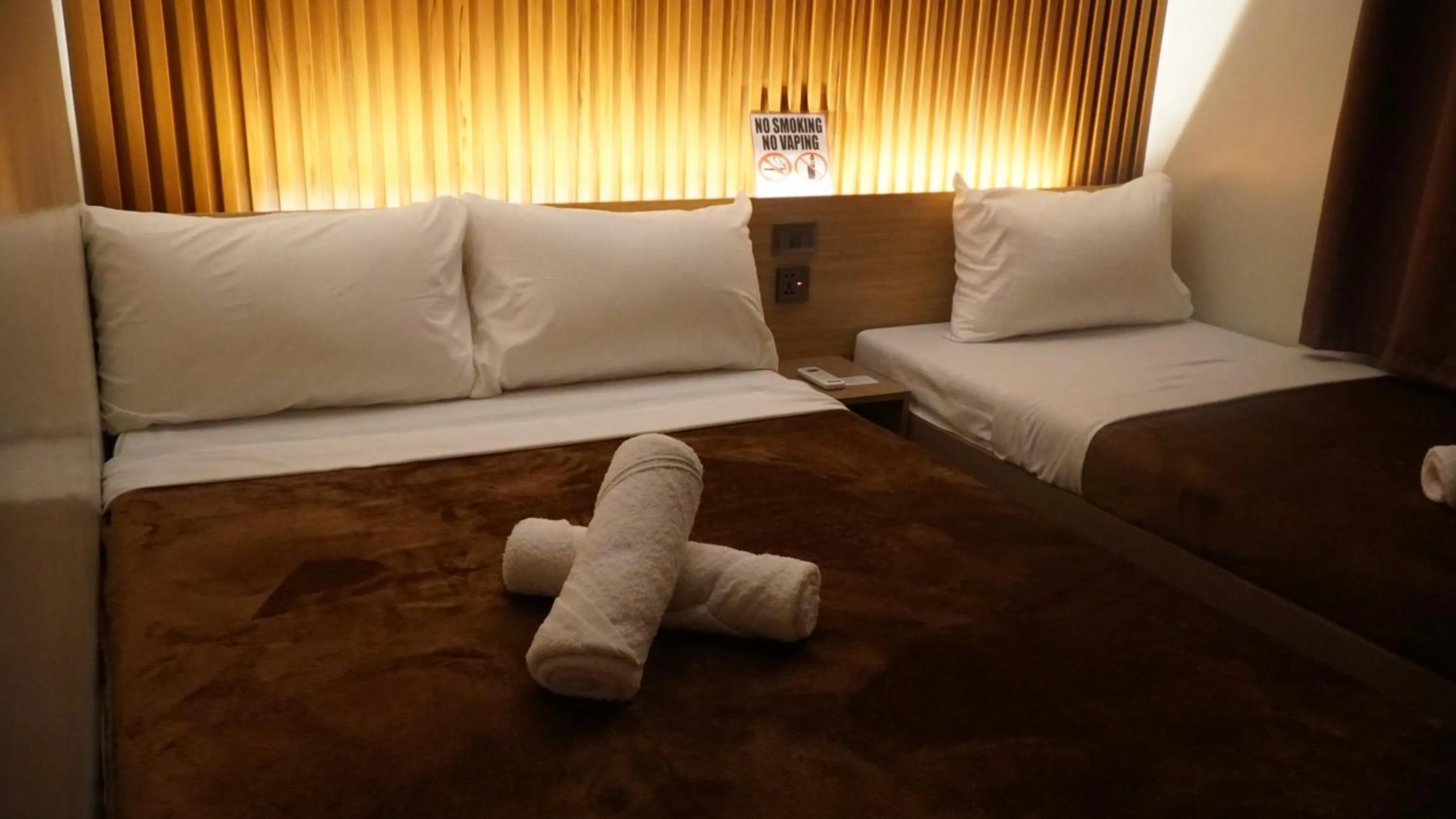 Bed in ZenSuites Hotel Tacloban