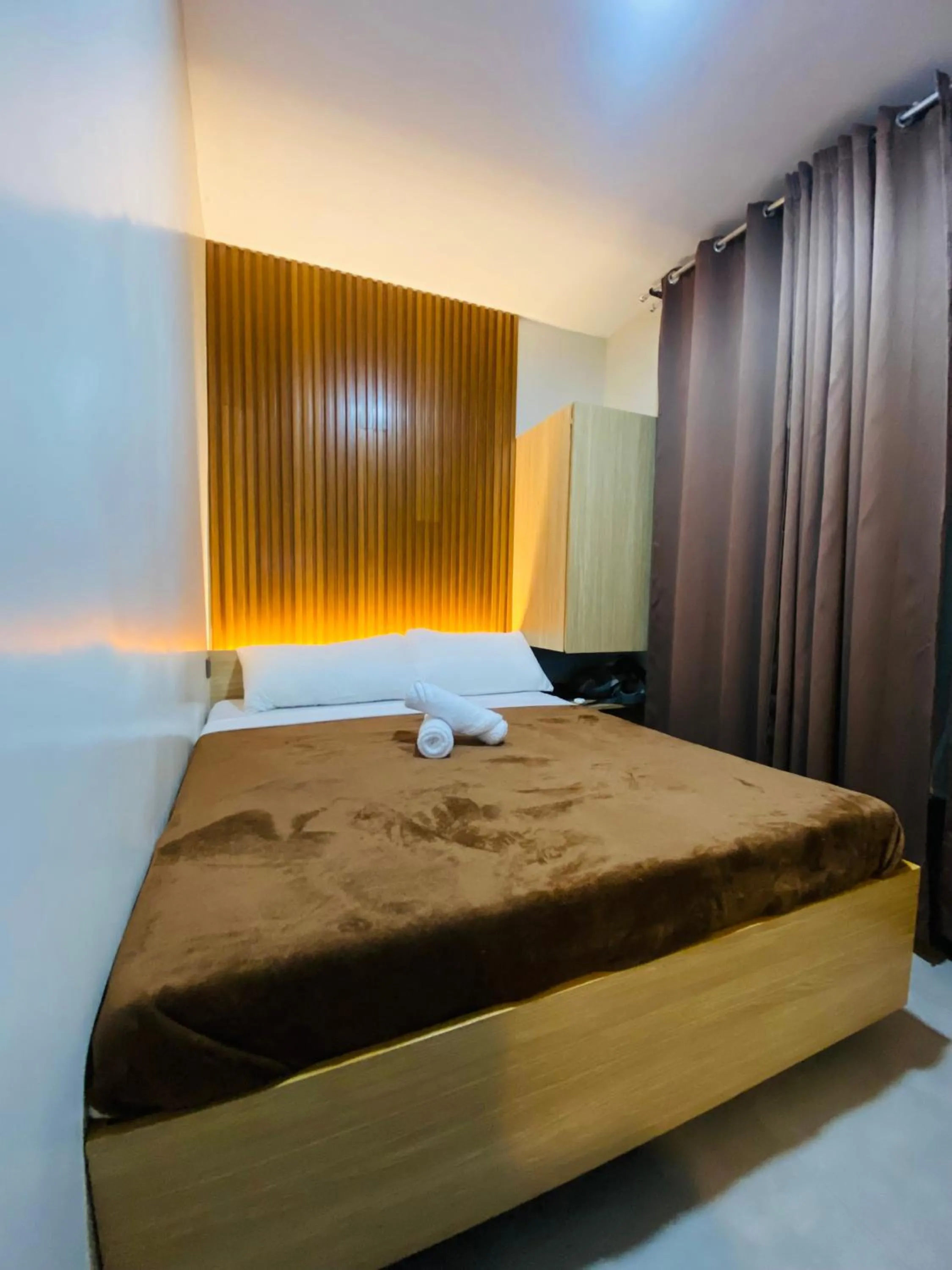 Bed in ZenSuites Hotel Tacloban