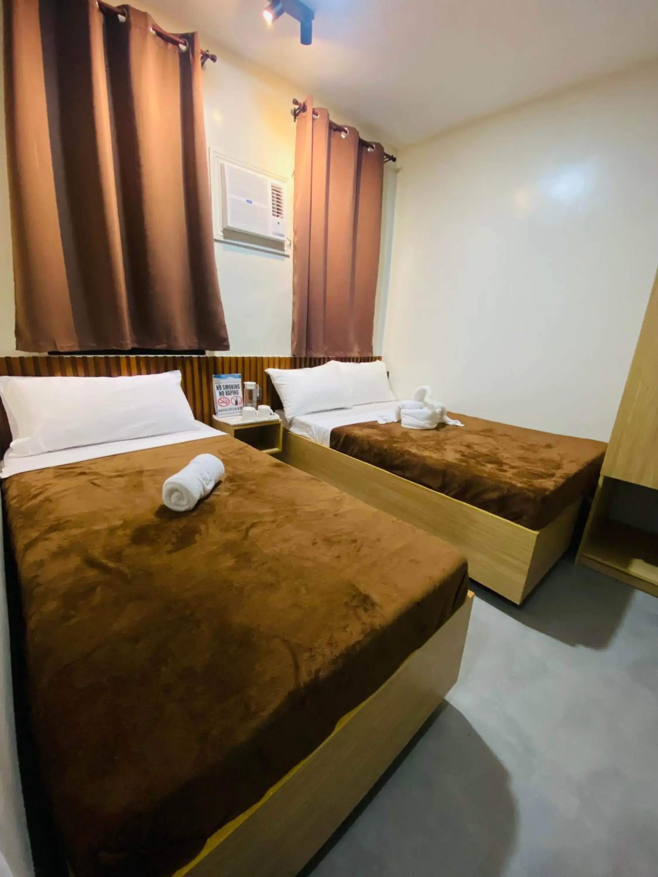 Triple Room in ZenSuites Hotel Tacloban Triple Room in ZenSuites Hotel Tacloban