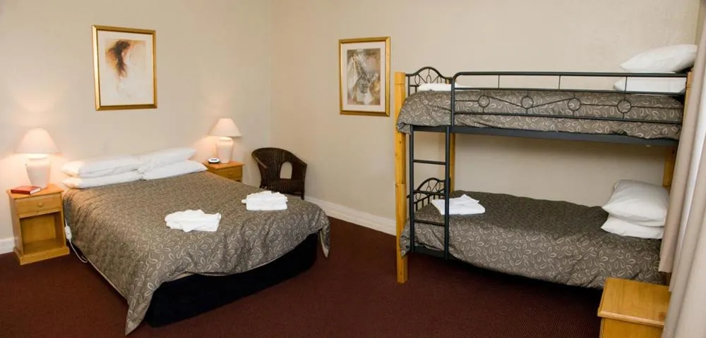 Family Room with Private Bathroom in The Alpine Hotel