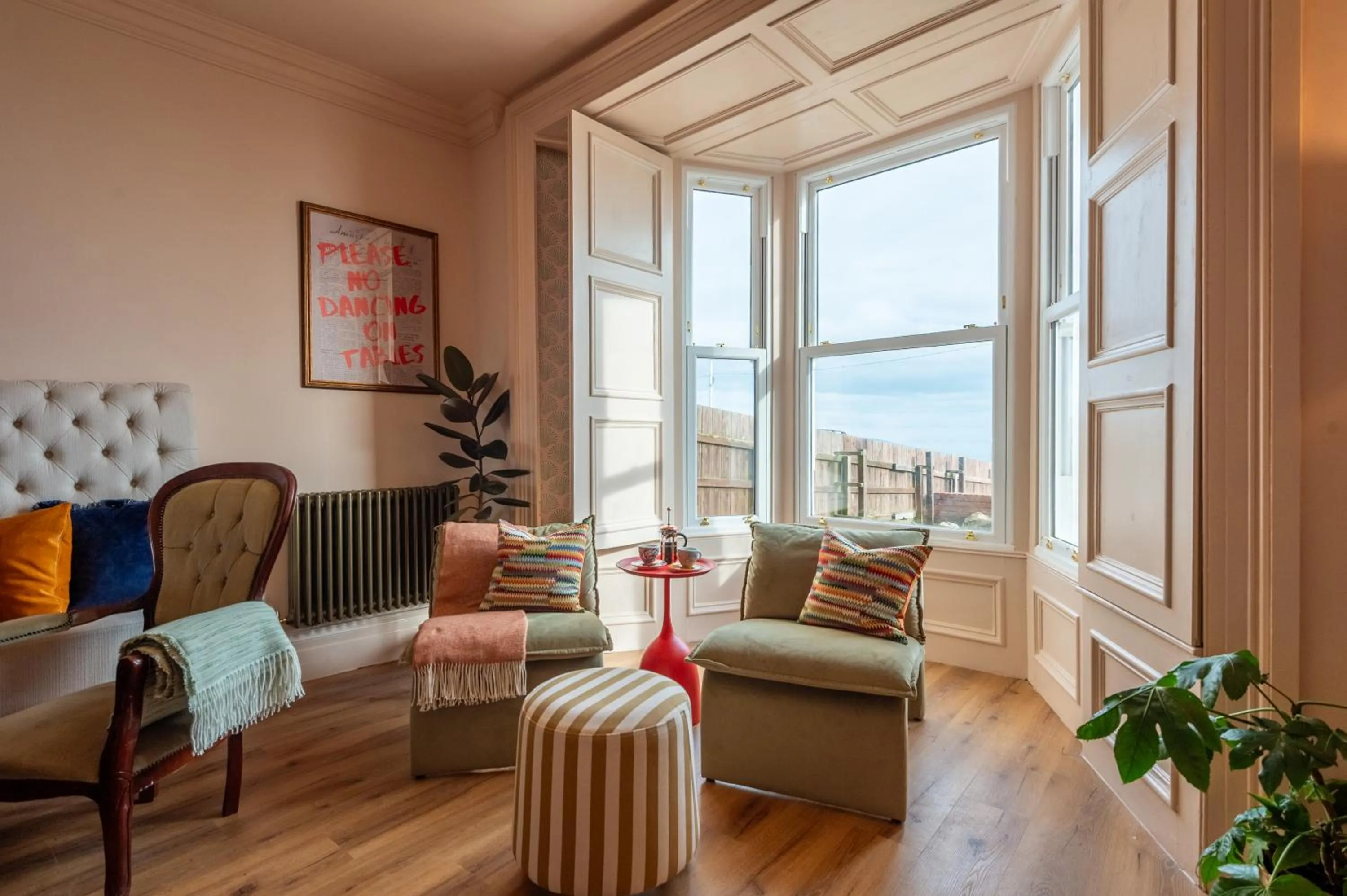 Lounge or bar in The Beach House Boutique Hotel