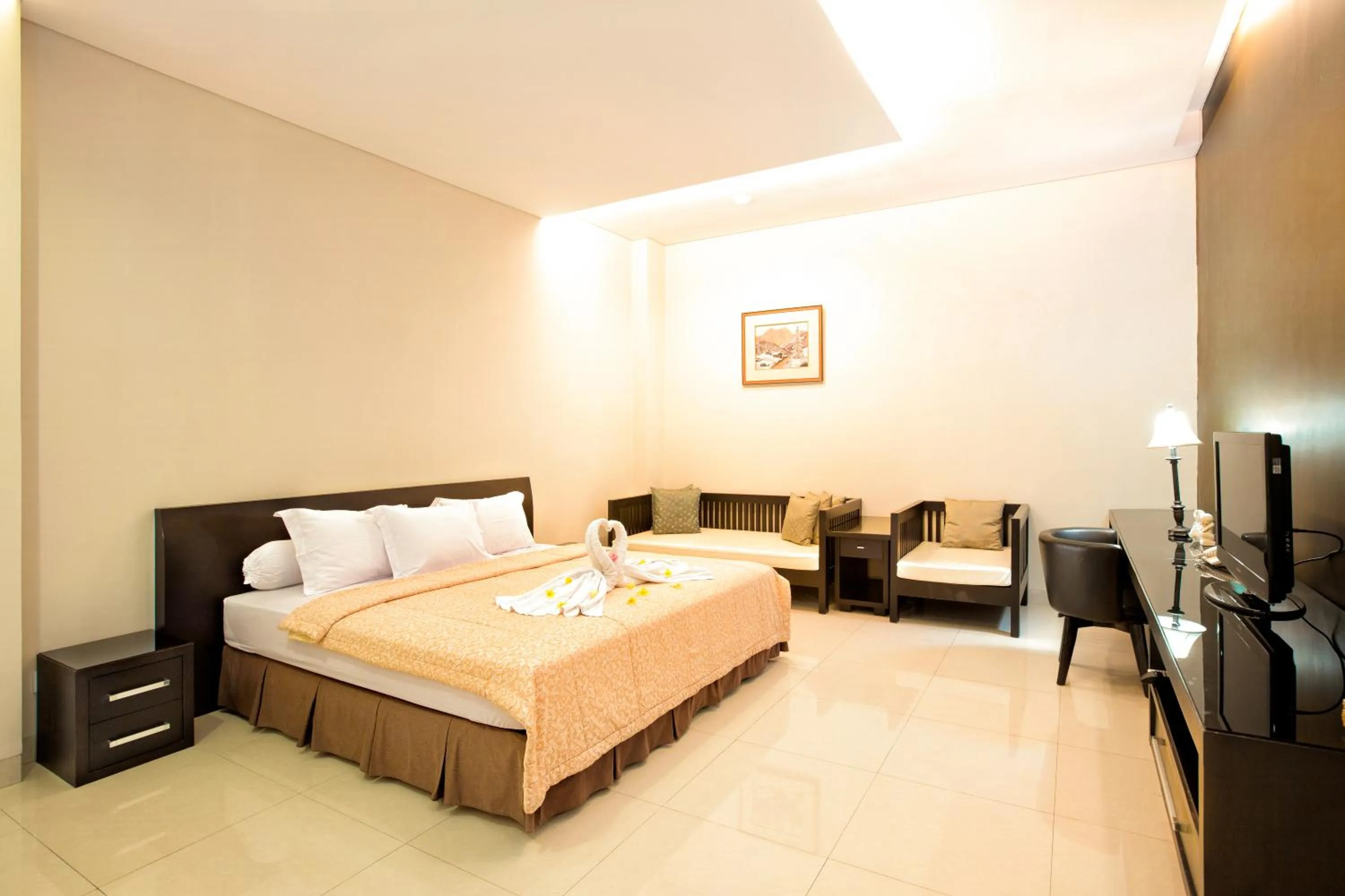 Bed in InKuta Residence and Villa