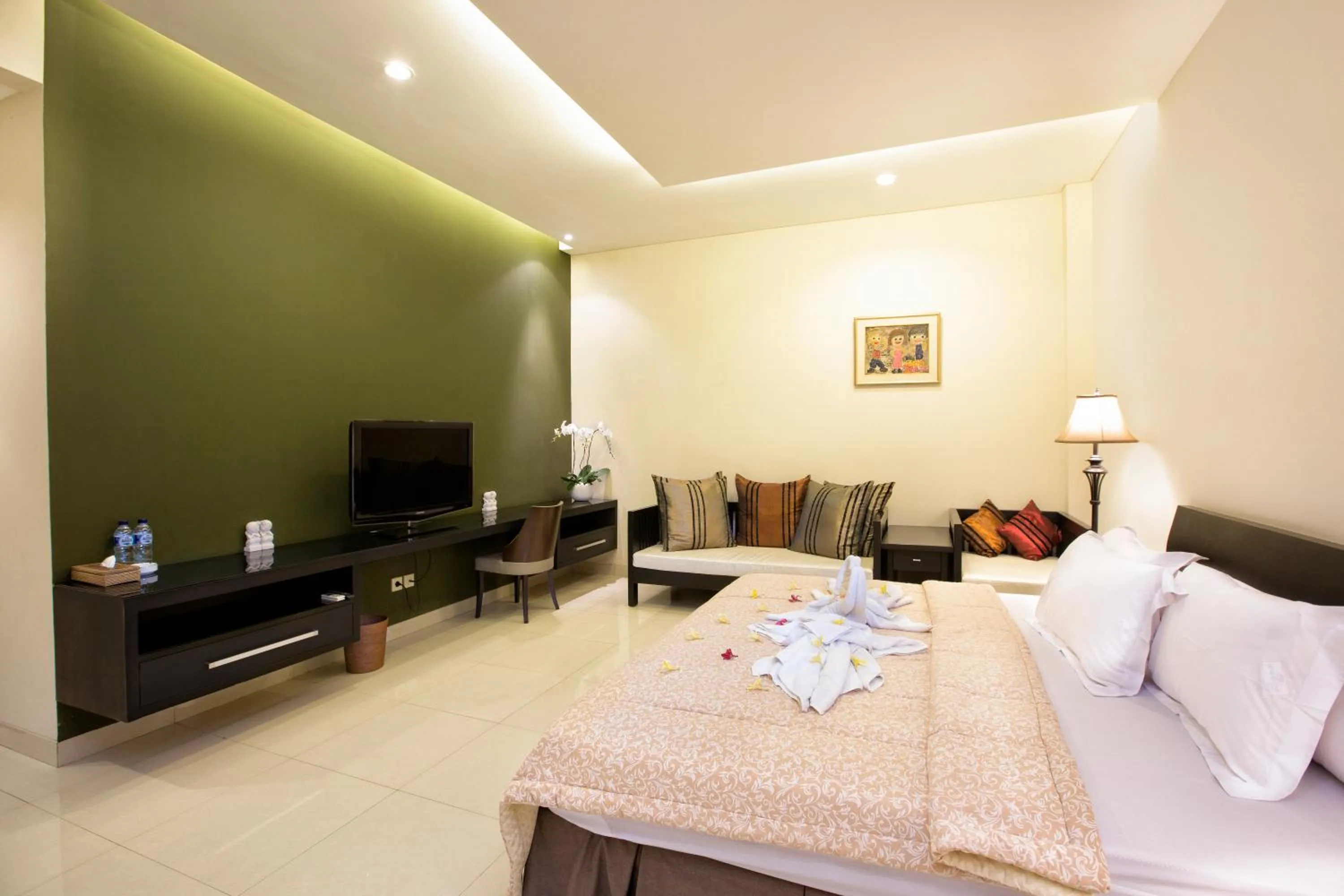 Bed in InKuta Residence and Villa