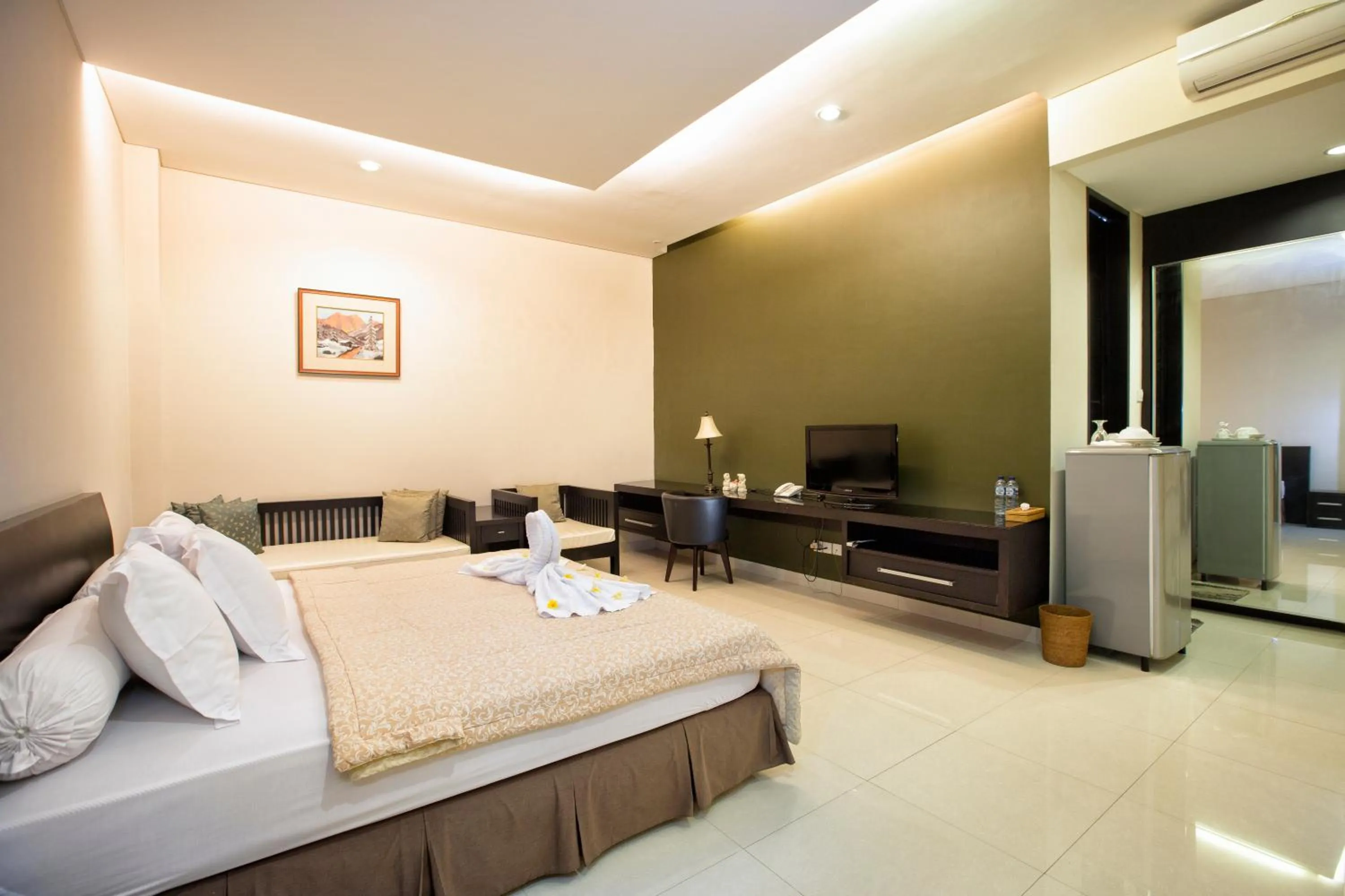 Bed in InKuta Residence and Villa