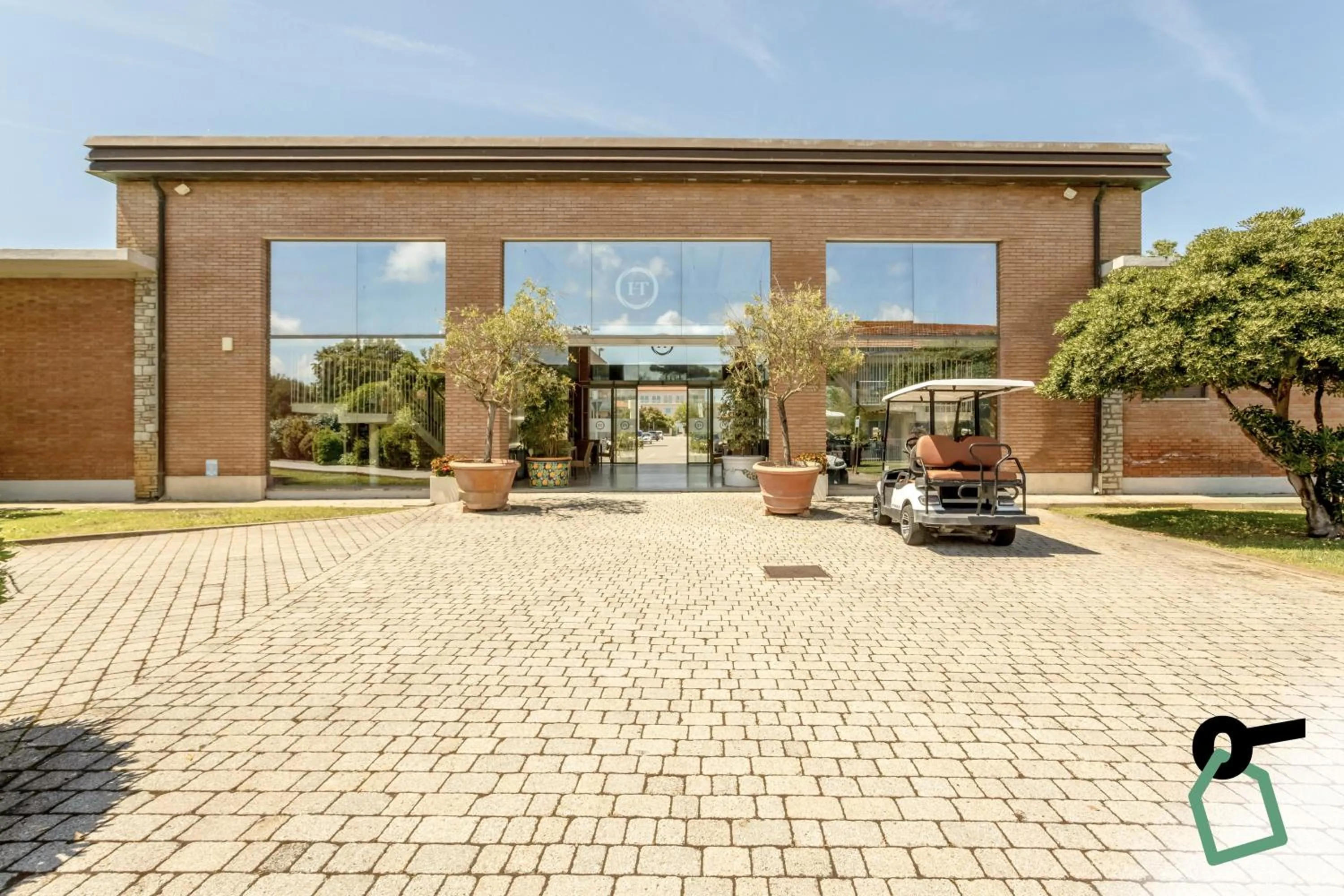 Property building in HOTIDAY Room Collection - Calambrone