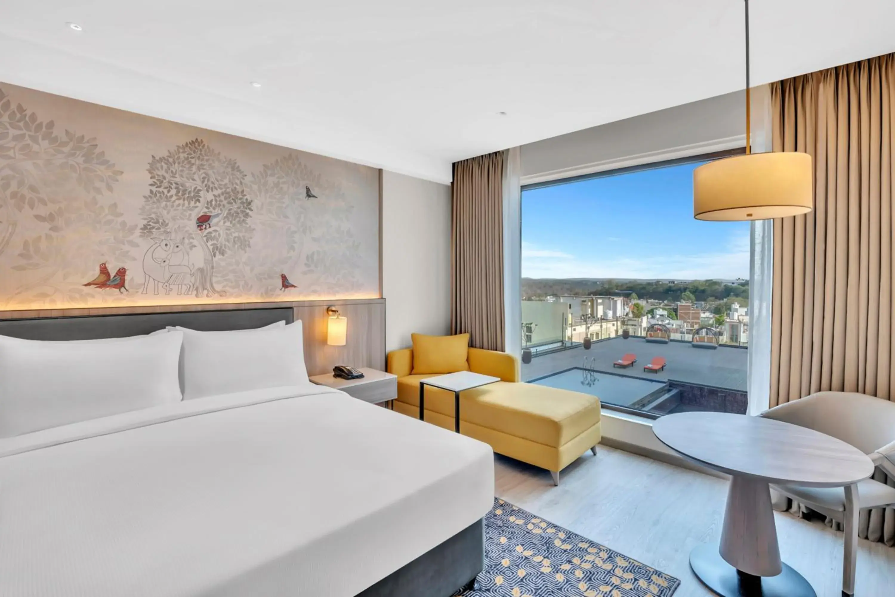 Pool view, Bed in Hilton Garden Inn Jabalpur Pool view, Bed in Hilton Garden Inn Jabalpur