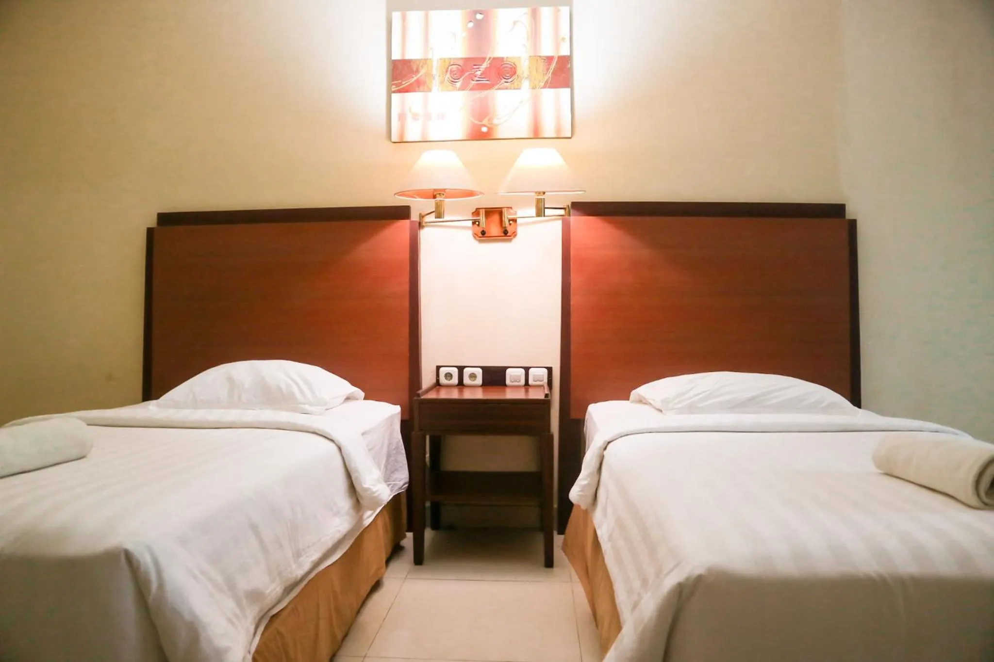 Bed in Hotel Mariat Sorong
