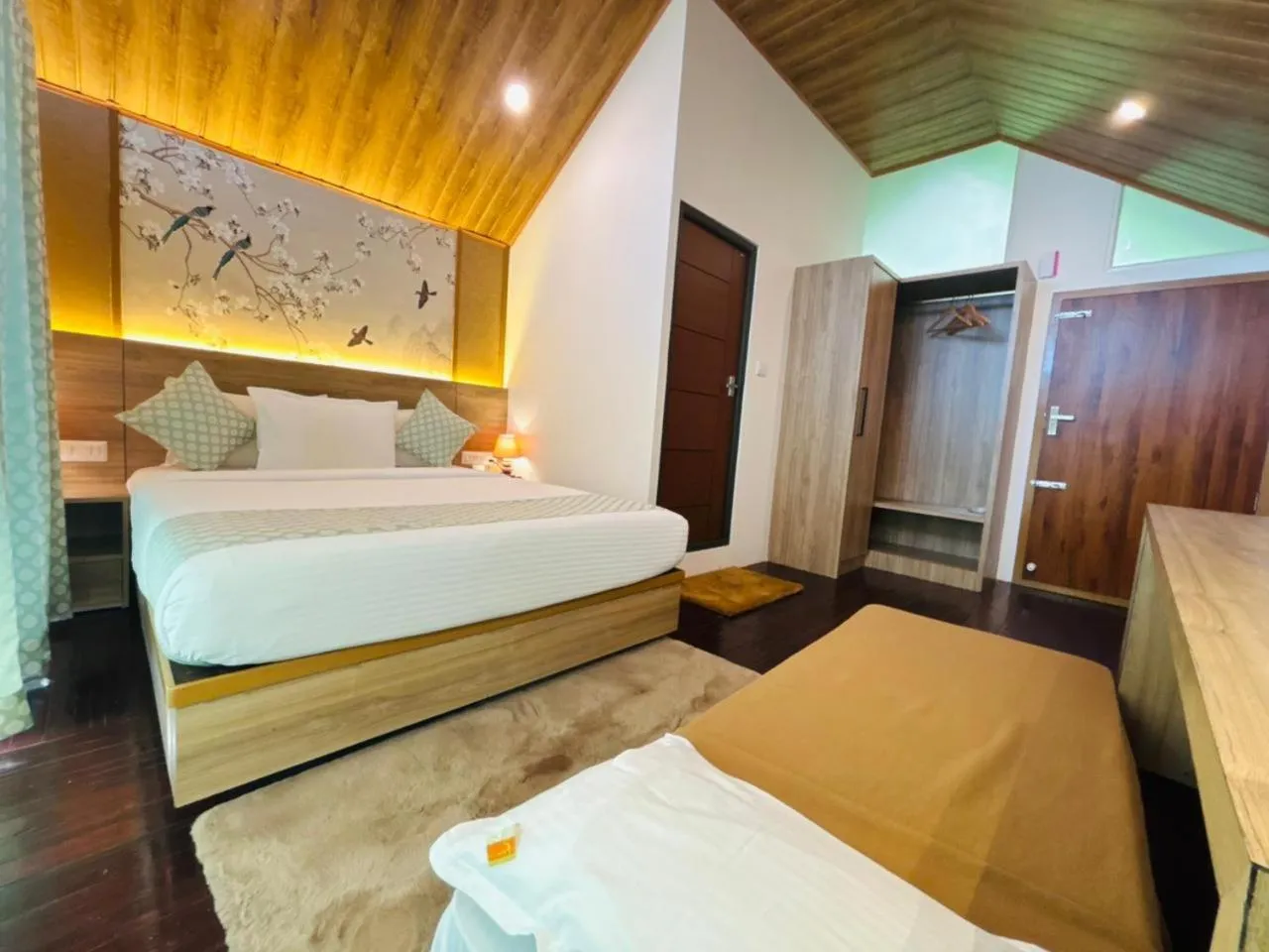 Photo of the whole room, Bed in Bamboo Dale Resort & Spa Munnar by Stride