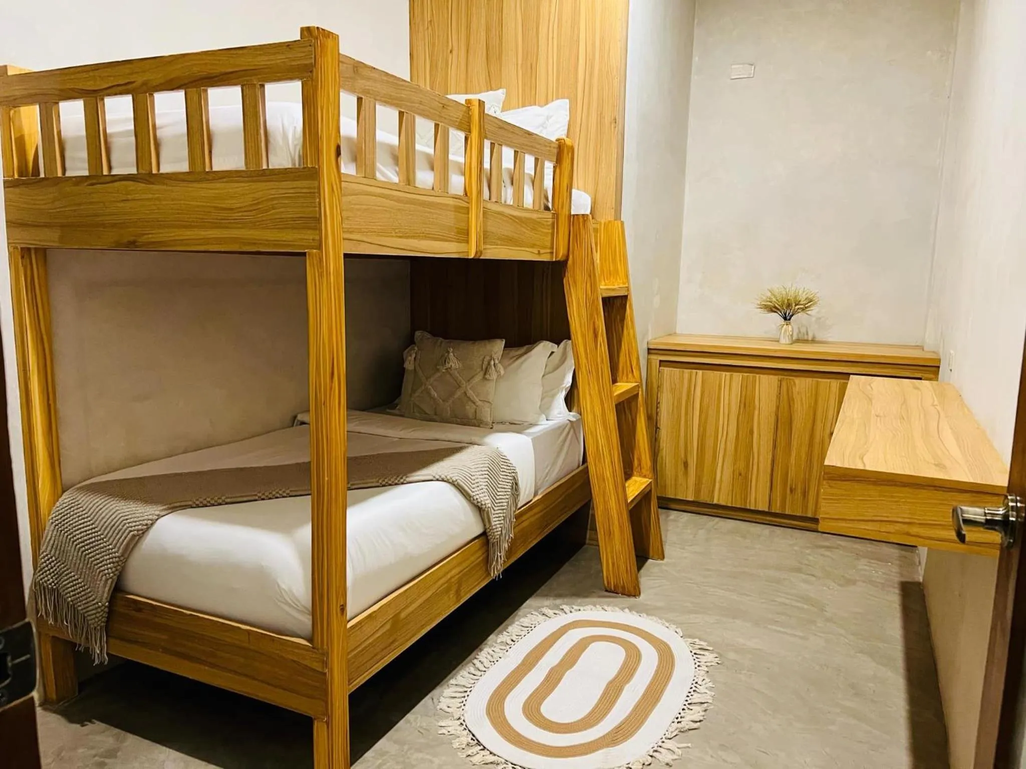 Bed in Lio Villas Resort