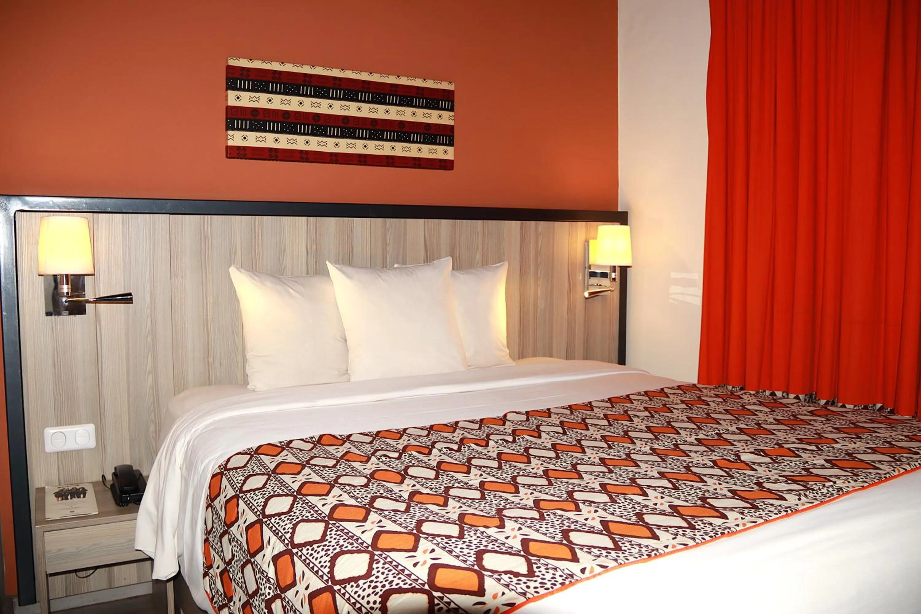 Bed in ONOMO Hotel Bamako