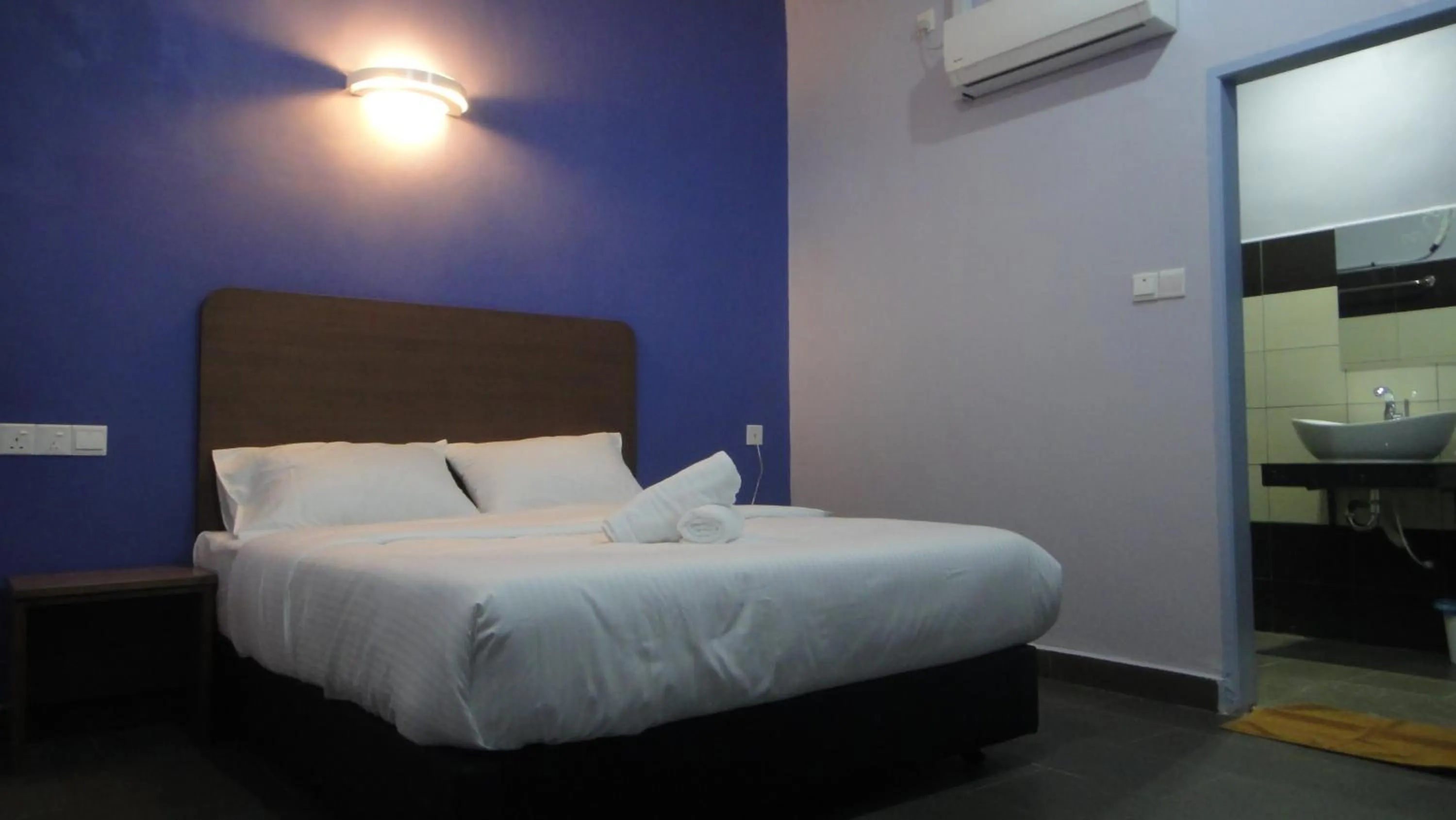 Bed in Micasa Hotel Labuan