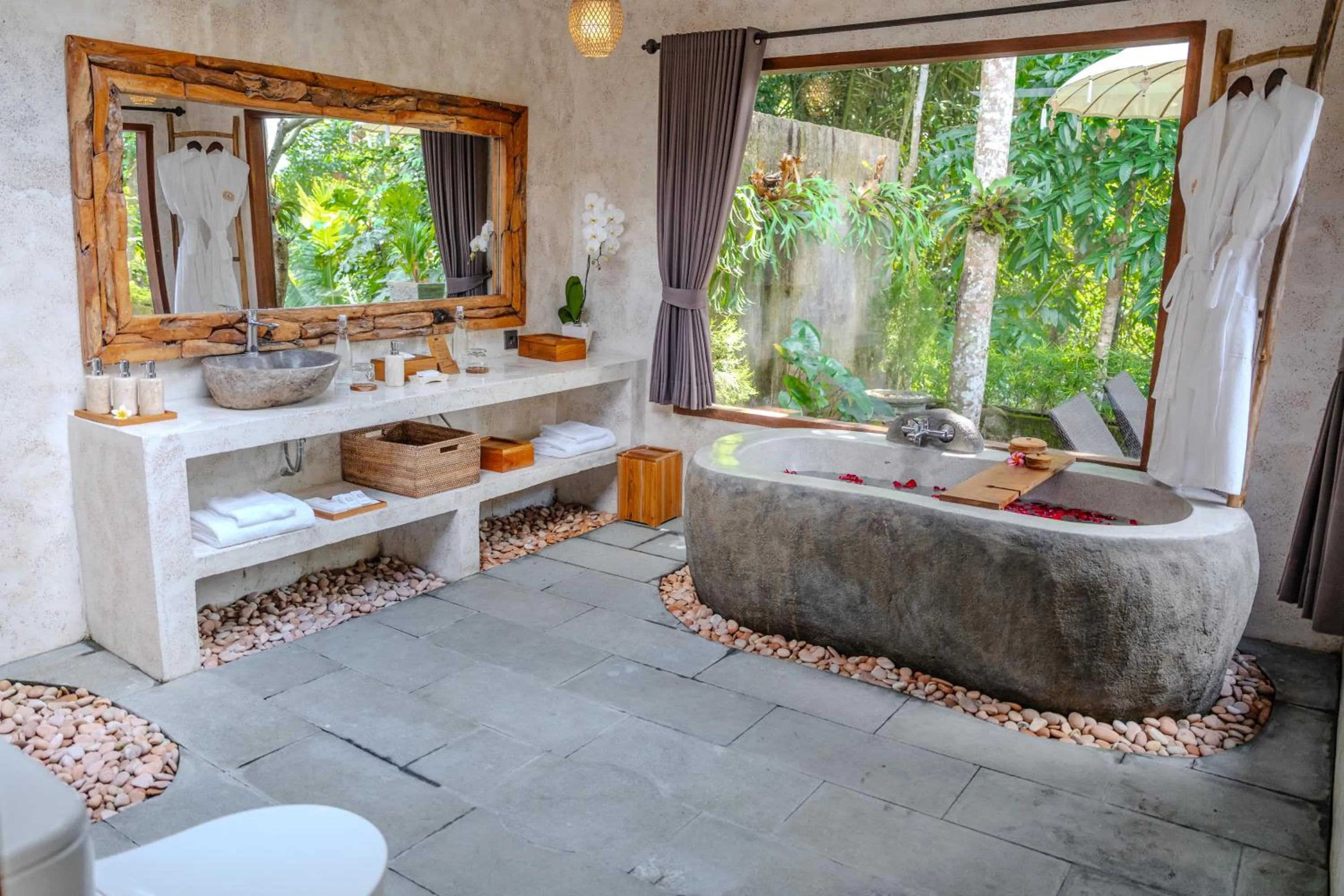 Bathroom in Hoshi Jungle Resort by Dhananjaya Hospitality