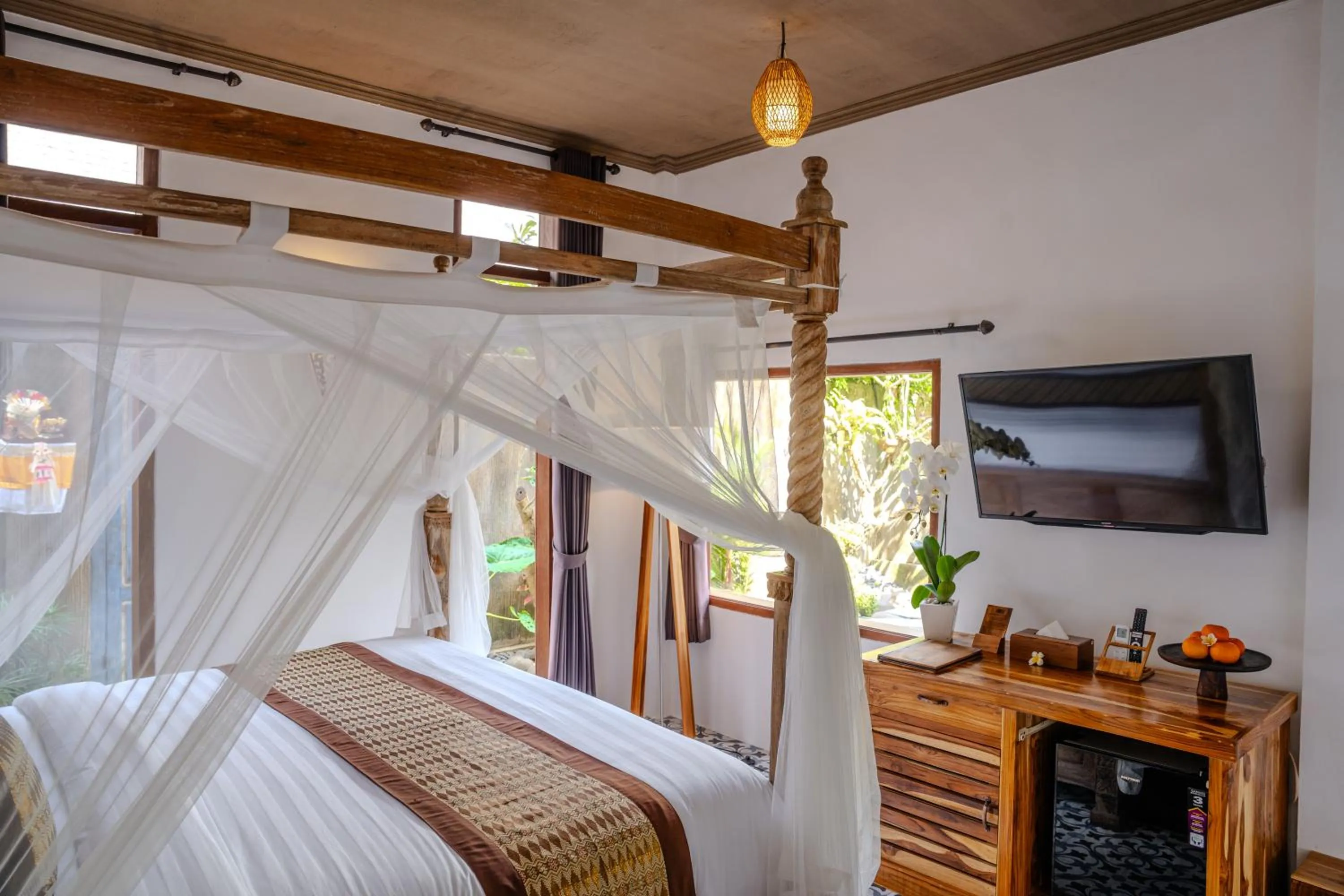 TV and multimedia, Bed in Hoshi Jungle Resort by Dhananjaya Hospitality